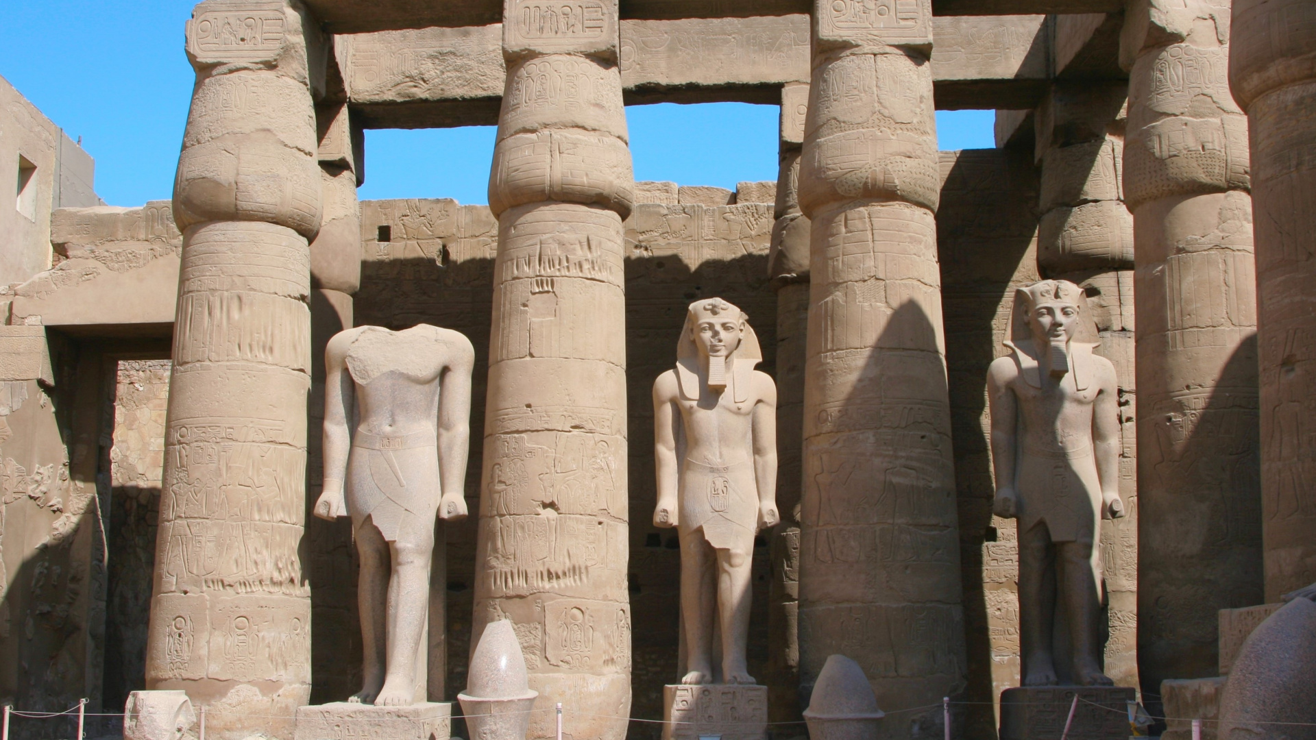 People Standing Near Concrete Statues During Daytime. Wallpaper in 1920x1080 Resolution