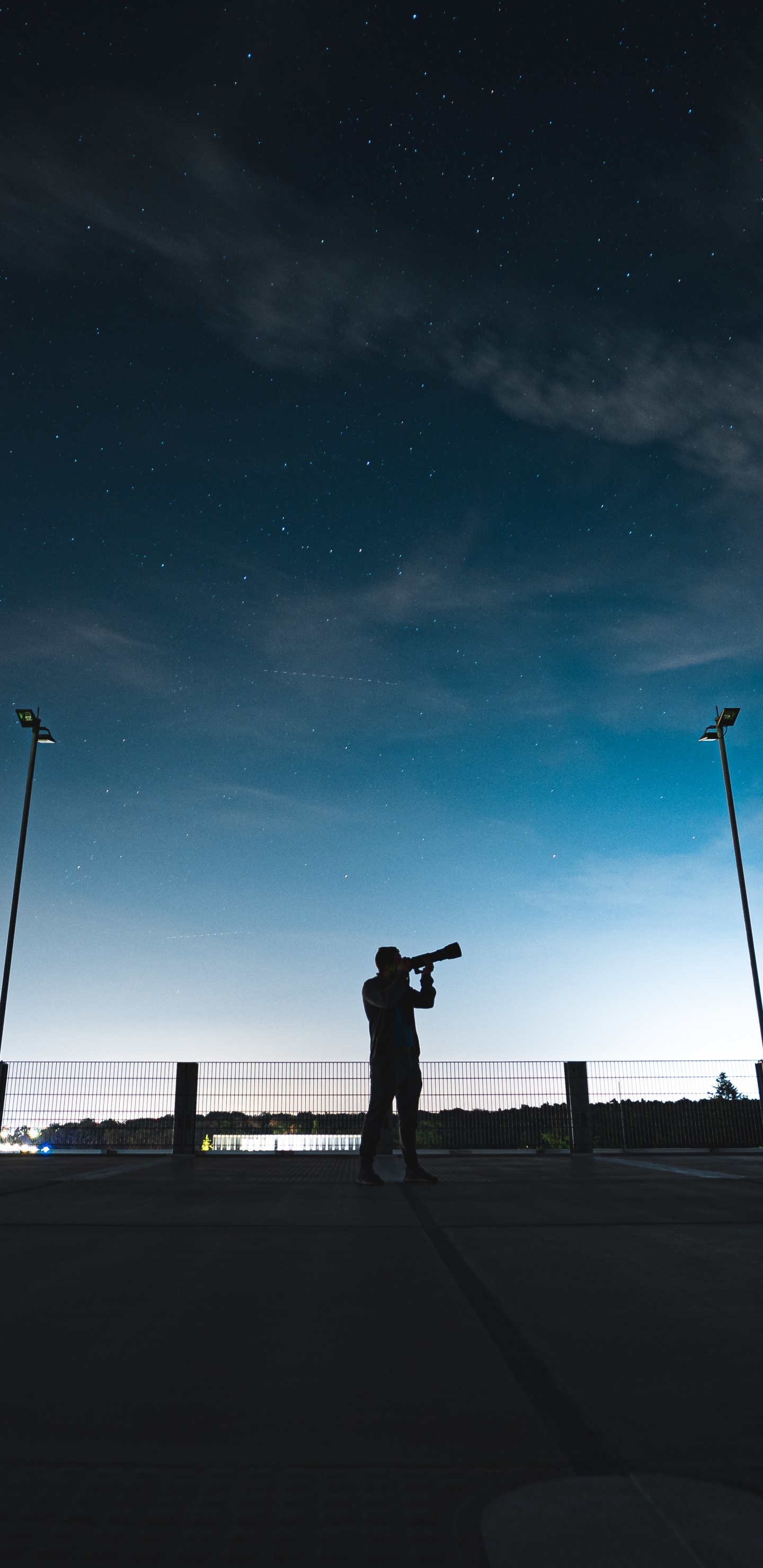 Silhouette of Person Standing on Sidewalk During Night Time. Wallpaper in 1440x2960 Resolution