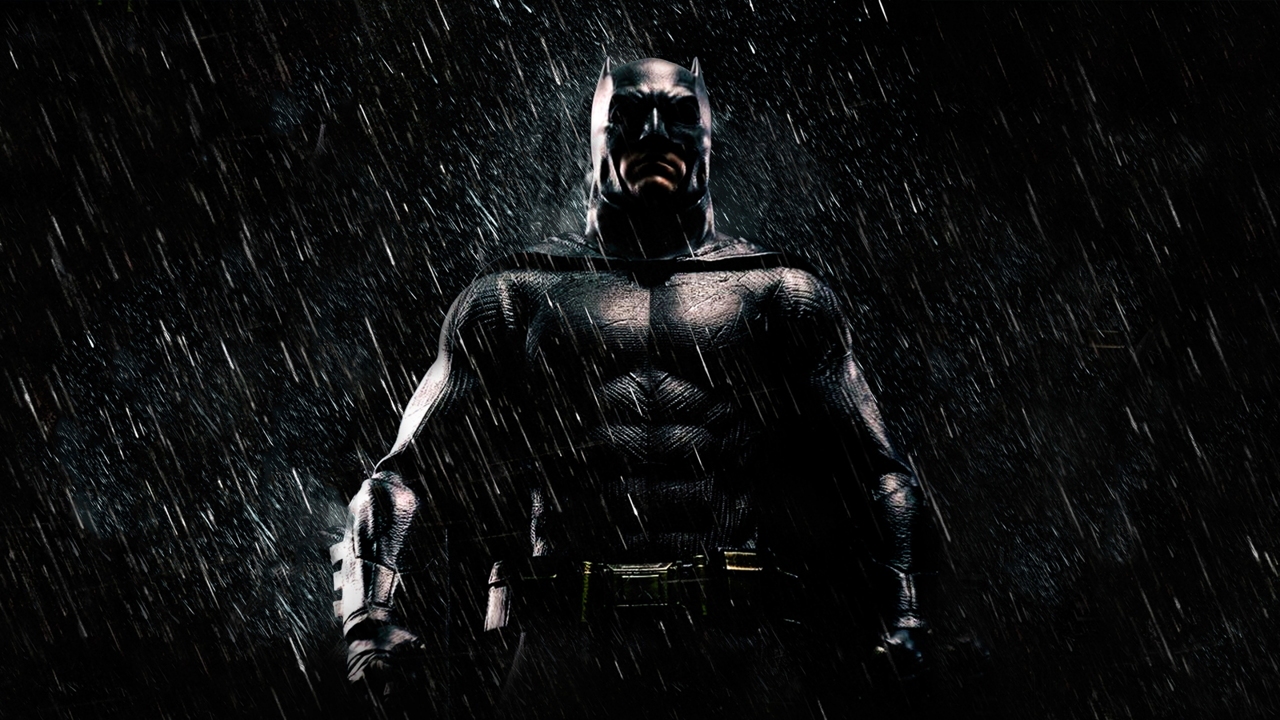 Homme en Costume Noir Avec Masque Noir. Wallpaper in 2560x1440 Resolution