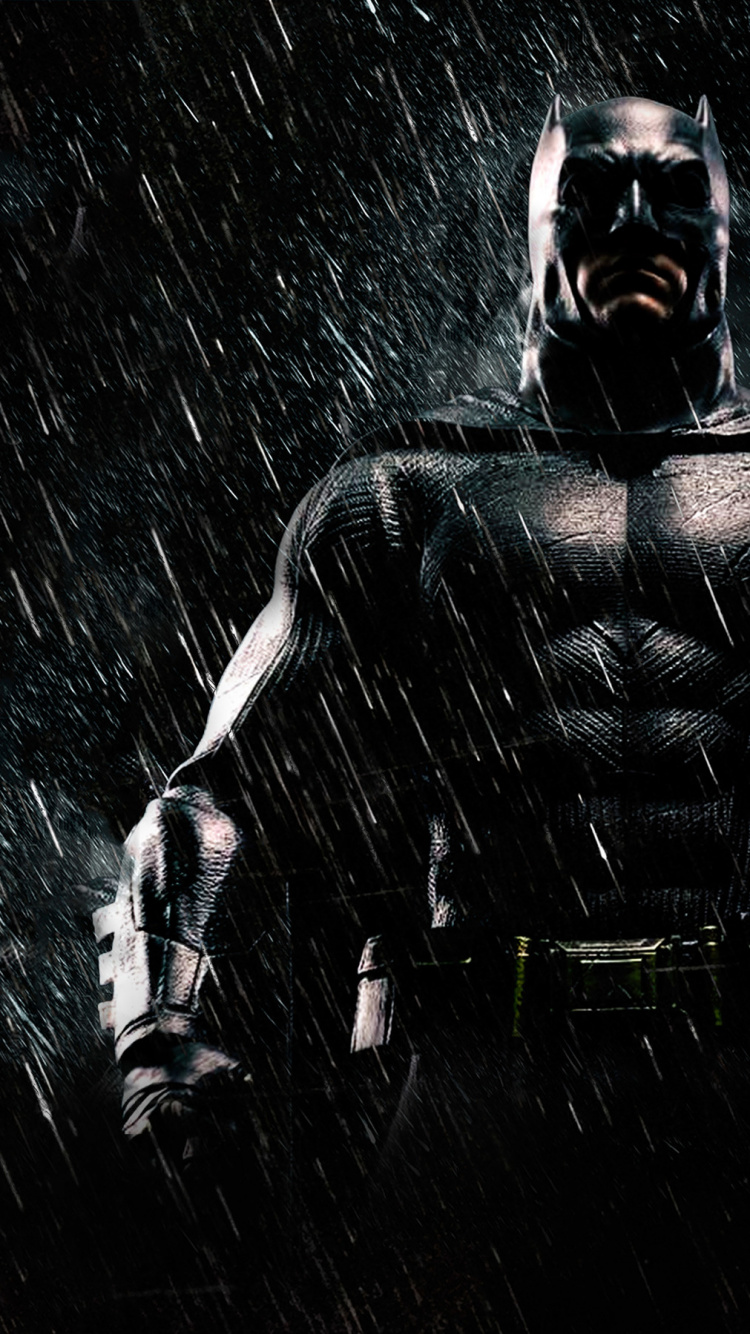 Homme en Costume Noir Avec Masque Noir. Wallpaper in 750x1334 Resolution