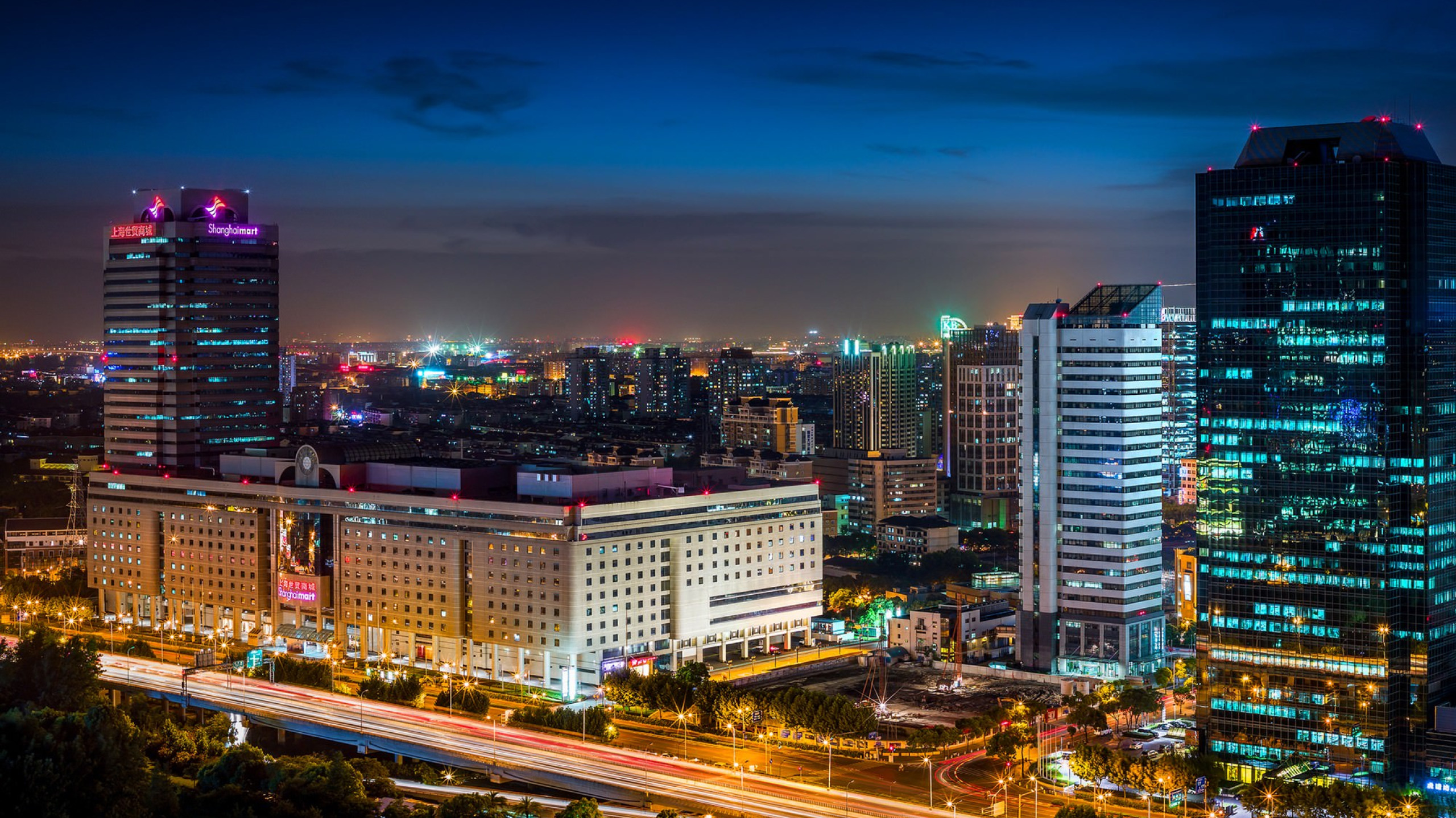 City Skyline During Night Time. Wallpaper in 2560x1440 Resolution