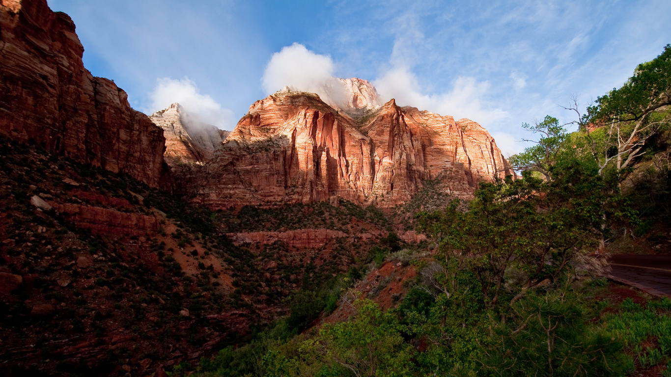 Brown Rocky Mountain Under Blue Sky During Daytime. Wallpaper in 1366x768 Resolution
