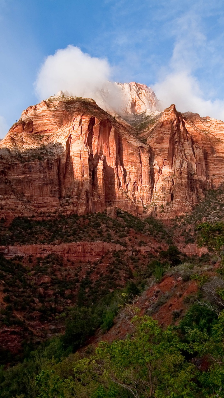 Brown Rocky Mountain Under Blue Sky During Daytime. Wallpaper in 720x1280 Resolution