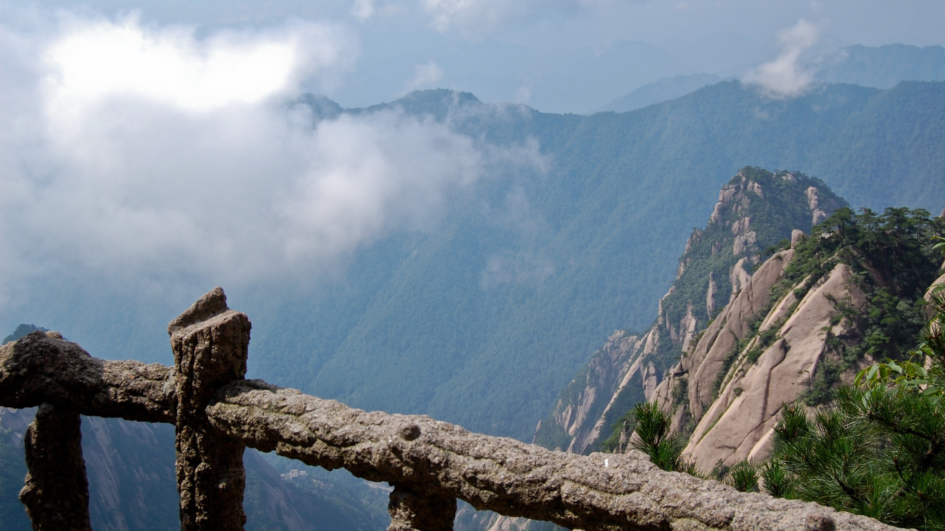 Brown Wooden Fence on Top of Mountain During Daytime. Wallpaper in 1366x768 Resolution