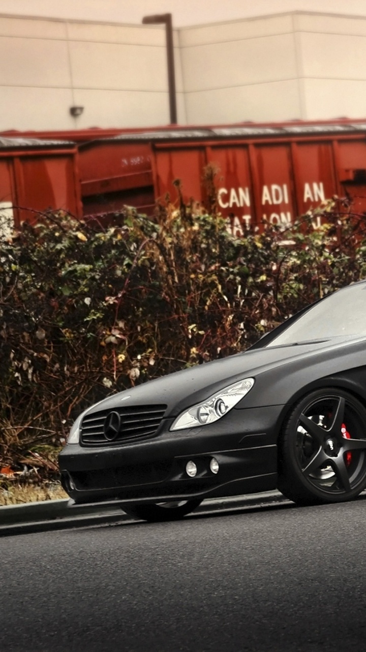 Black Porsche 911 Parked on Road During Daytime. Wallpaper in 720x1280 Resolution