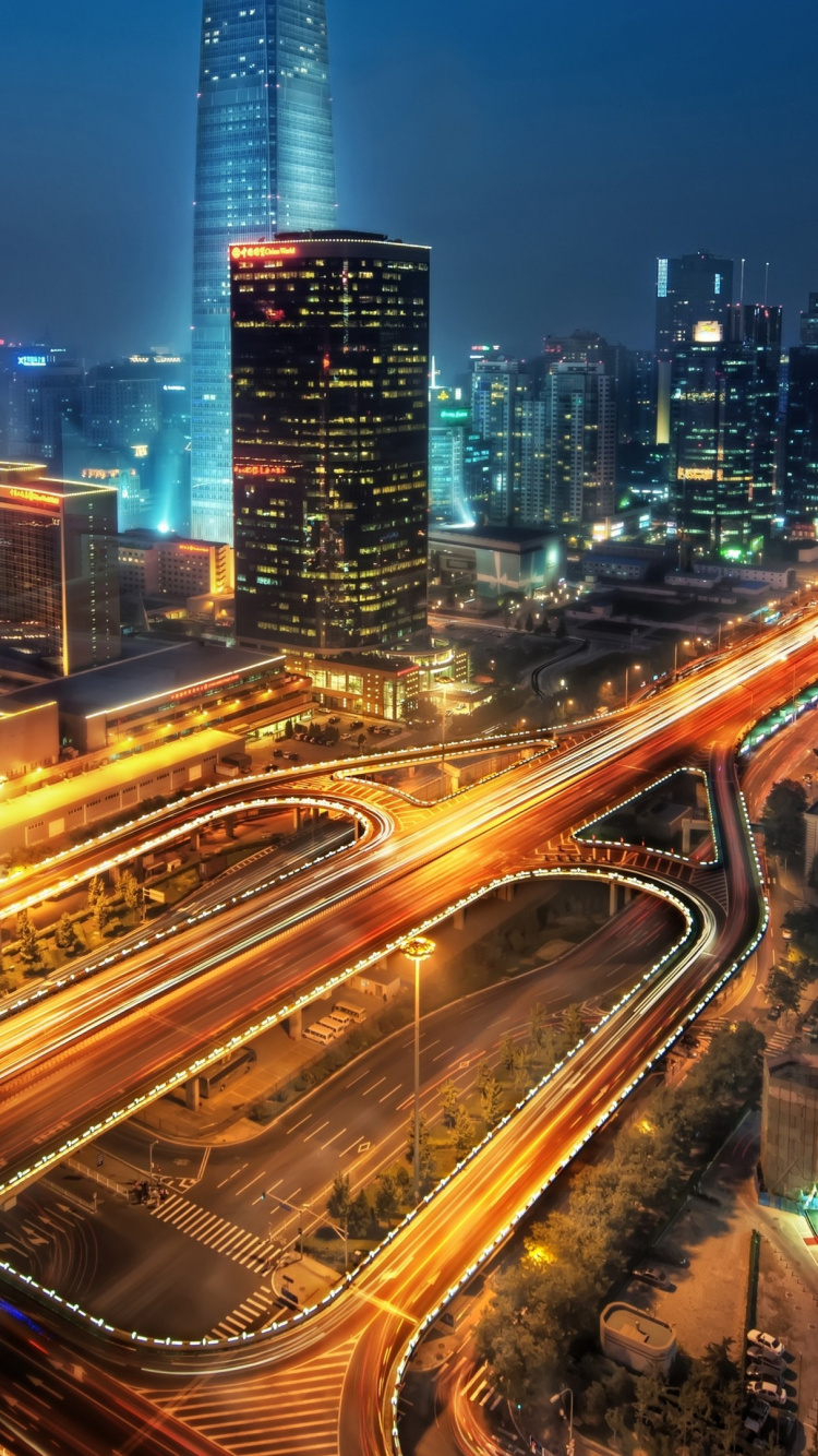 Photographie en Accéléré de la Ville Pendant la Nuit. Wallpaper in 750x1334 Resolution