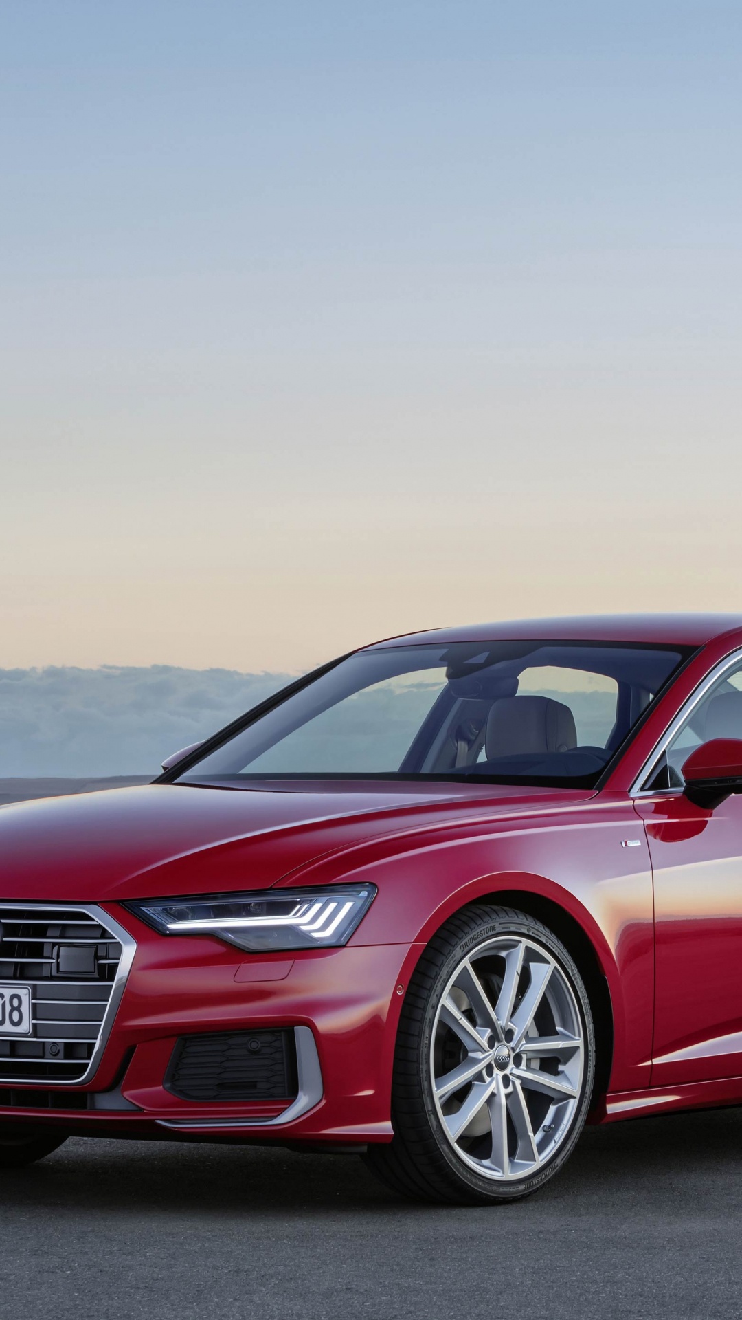 Red Audi a 4 Coupe on Road During Daytime. Wallpaper in 1080x1920 Resolution