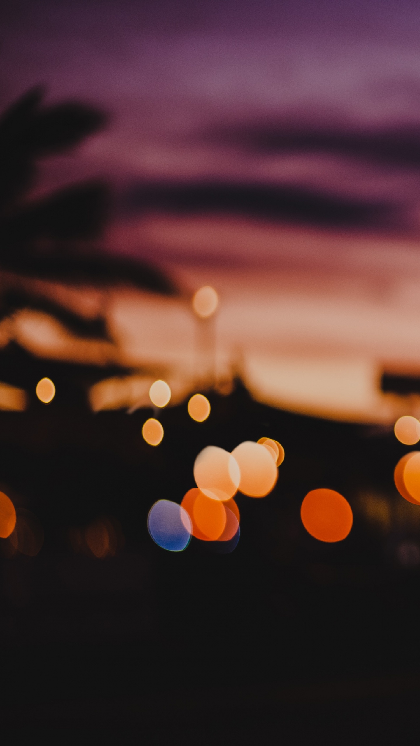 Bokeh-Fotografie Von Orangefarbenen Lichtern. Wallpaper in 1440x2560 Resolution