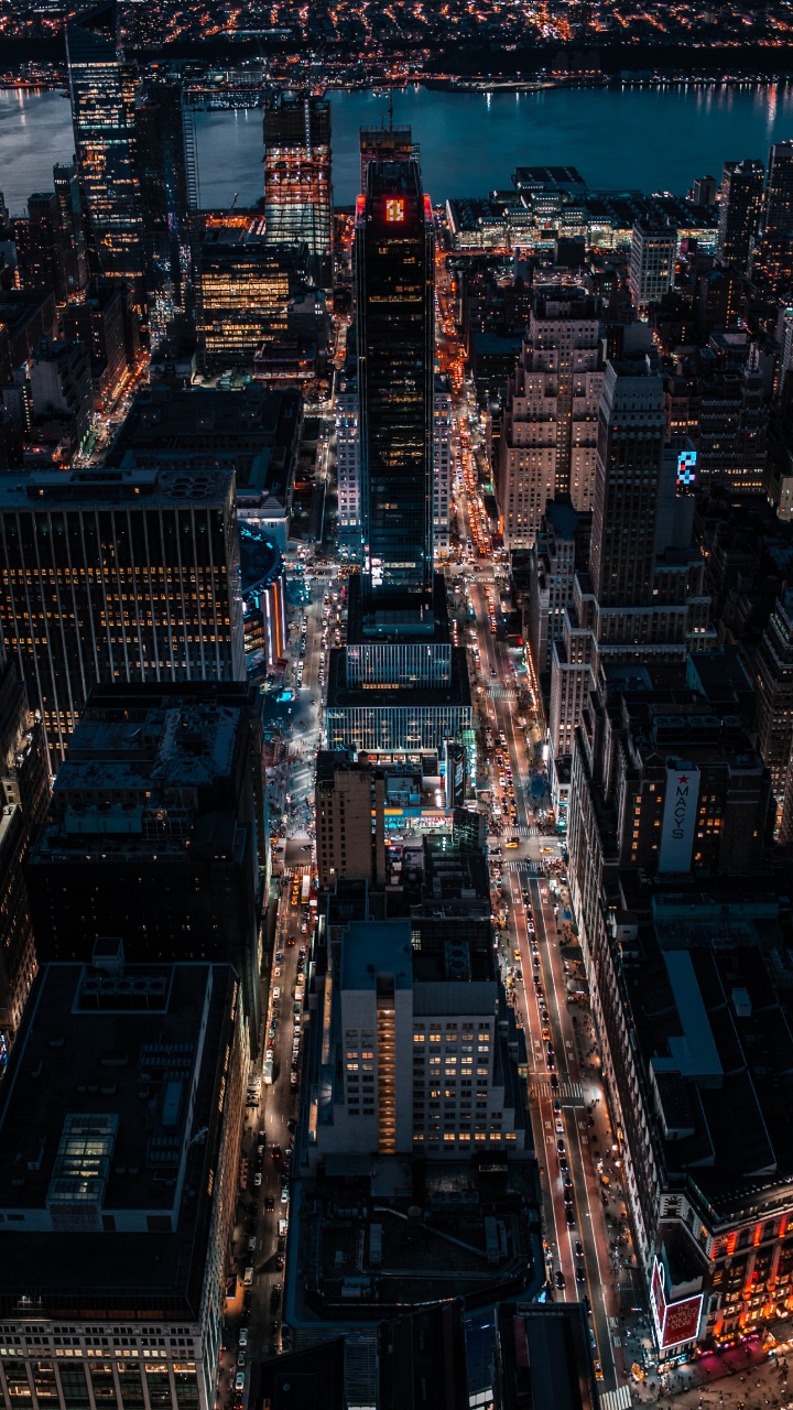 Aerial View of City Buildings During Night Time. Wallpaper in 720x1280 Resolution