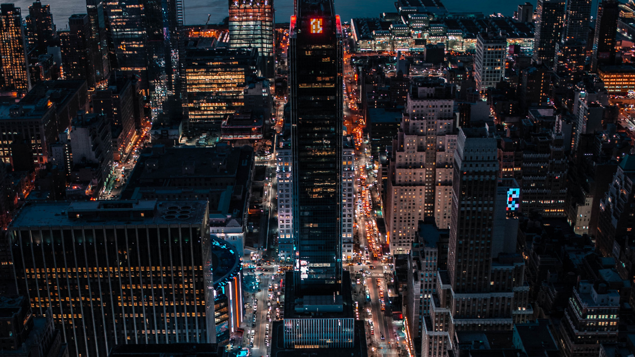 Vue Aérienne Des Bâtiments de la Ville Pendant la Nuit. Wallpaper in 1280x720 Resolution