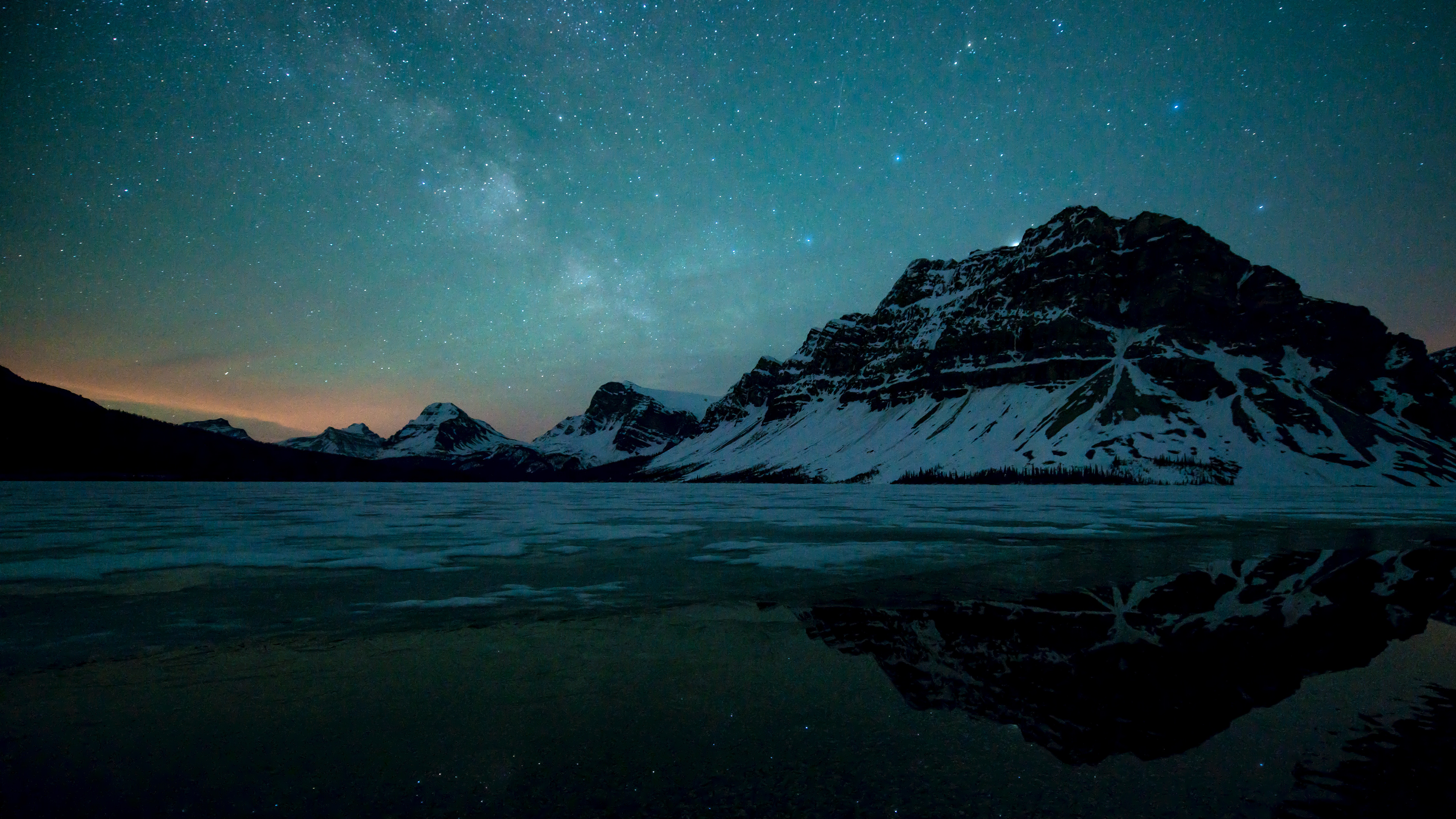 Snow Covered Mountain During Night Time. Wallpaper in 3840x2160 Resolution