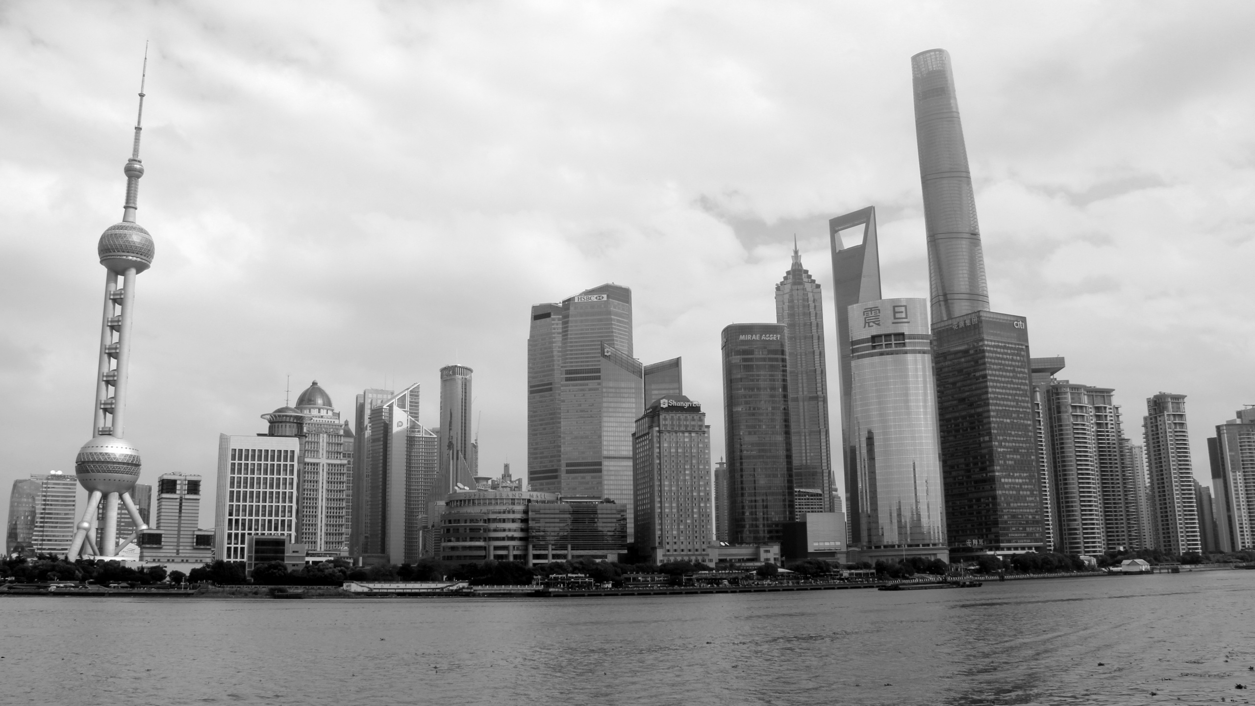 Grayscale Photo of High Rise Buildings. Wallpaper in 2560x1440 Resolution