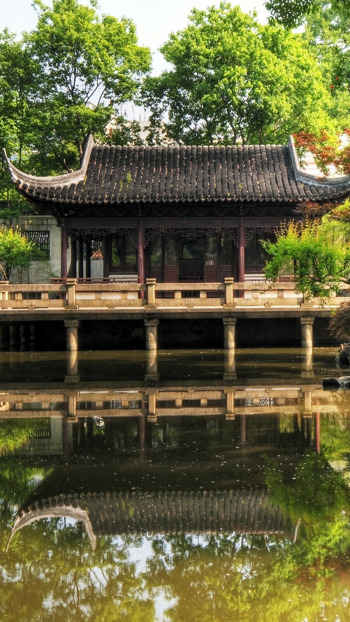 Brown Wooden House on River During Daytime. Wallpaper in 720x1280 Resolution