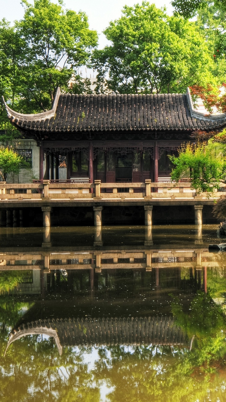 Brown Wooden House on River During Daytime. Wallpaper in 750x1334 Resolution
