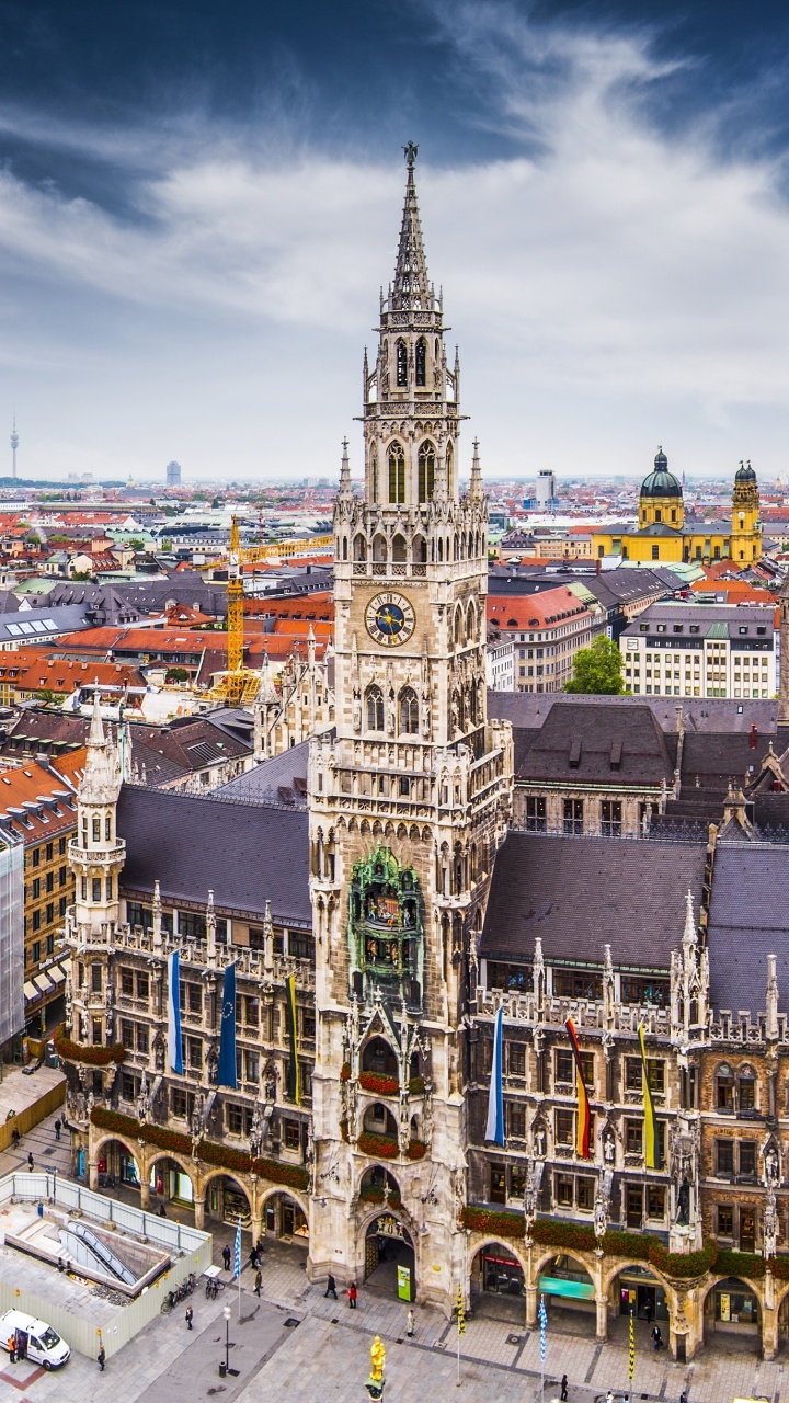 Brown and White Concrete Building Under Cloudy Sky During Daytime. Wallpaper in 720x1280 Resolution