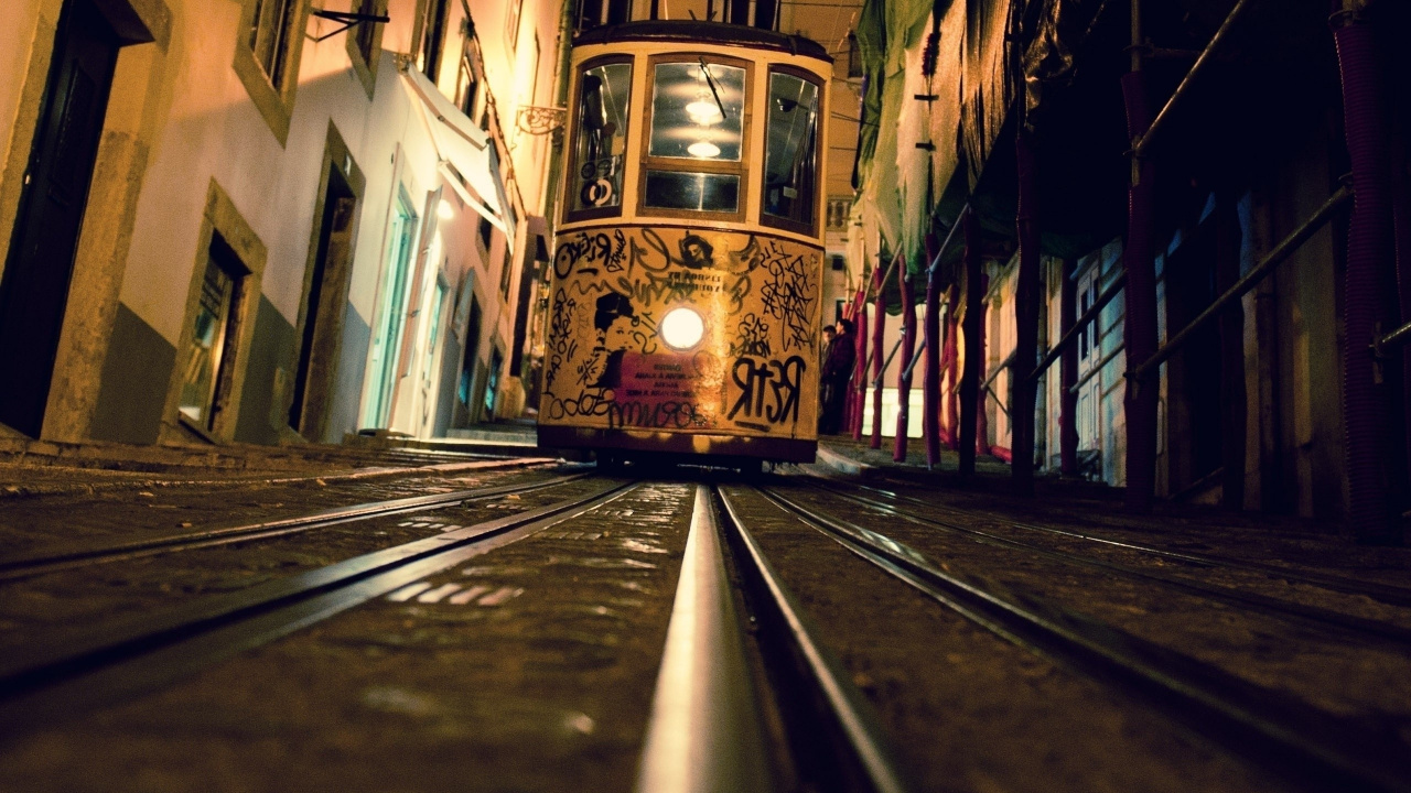 Yellow and Black Tram on Road During Daytime. Wallpaper in 1280x720 Resolution