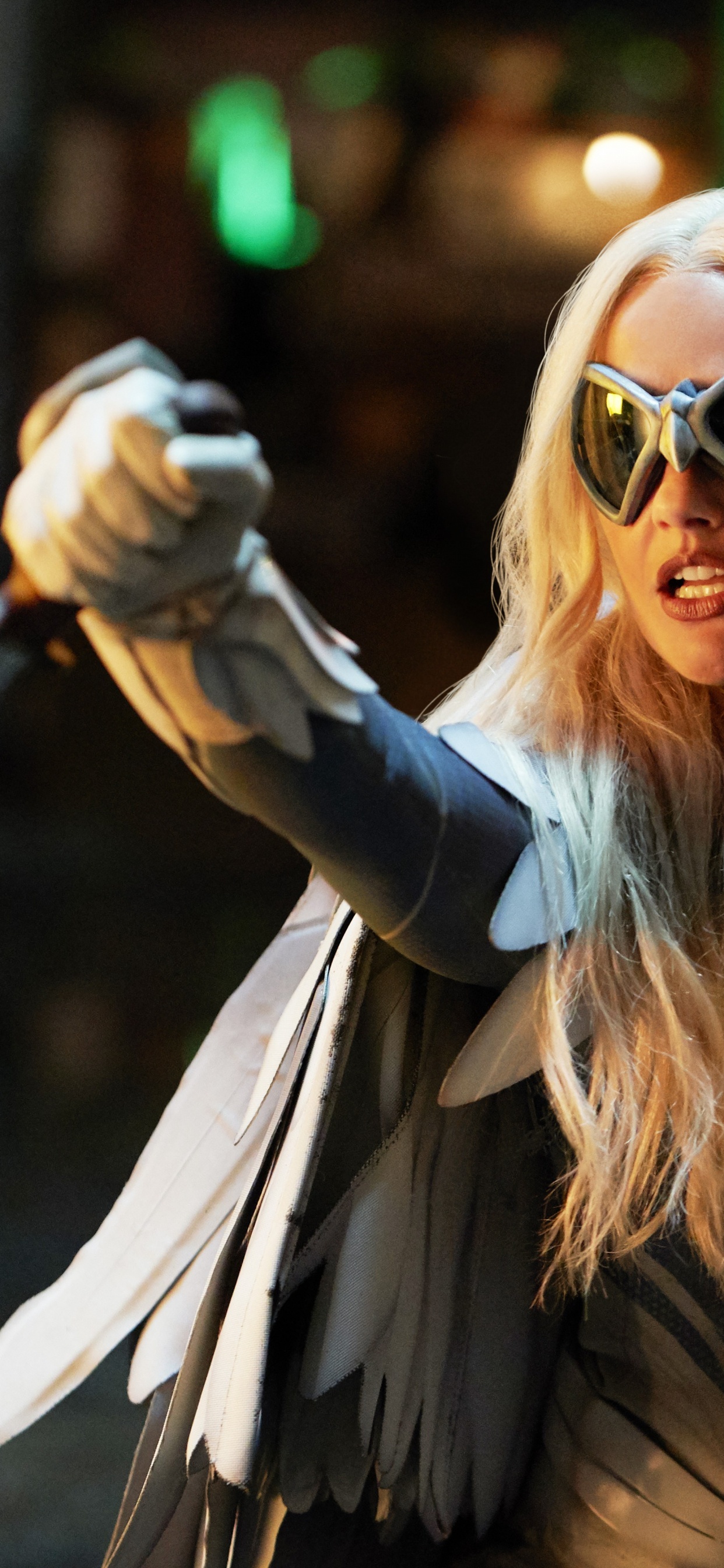 Woman in Black Leather Jacket Holding Black and White Umbrella During Daytime. Wallpaper in 1242x2688 Resolution