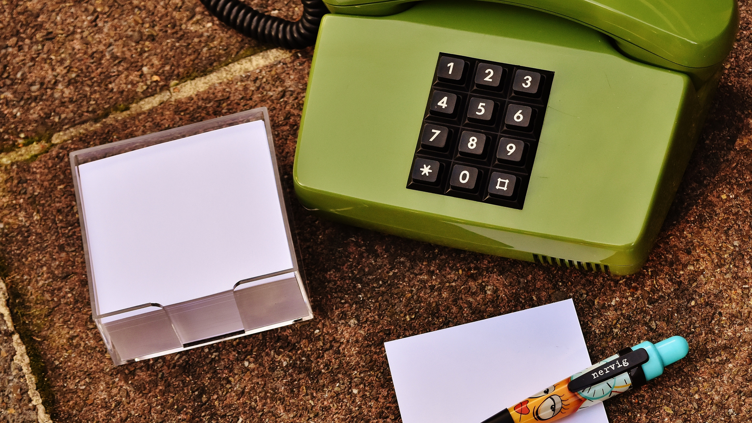 White Printer Paper Beside Green Telephone. Wallpaper in 2560x1440 Resolution