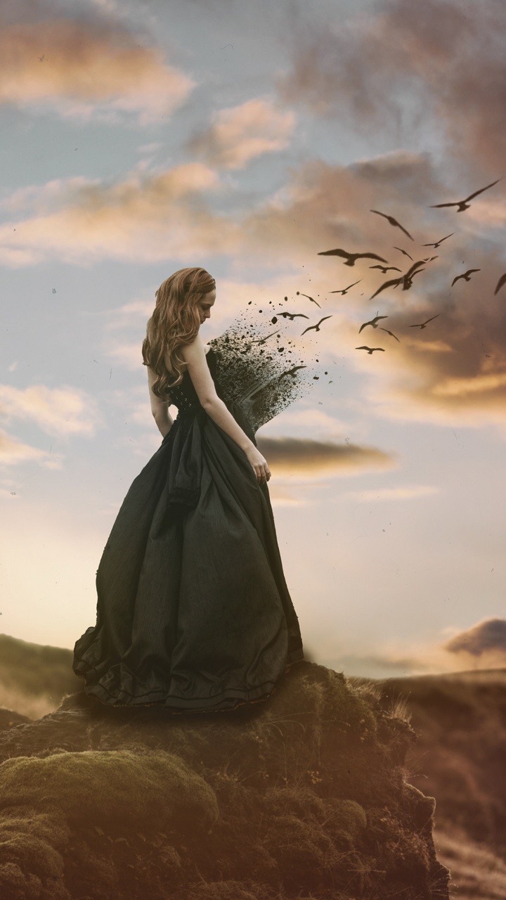 Frau im Weißen Kleid, Die Tagsüber Auf Einer Braunen Felsformation Steht. Wallpaper in 720x1280 Resolution