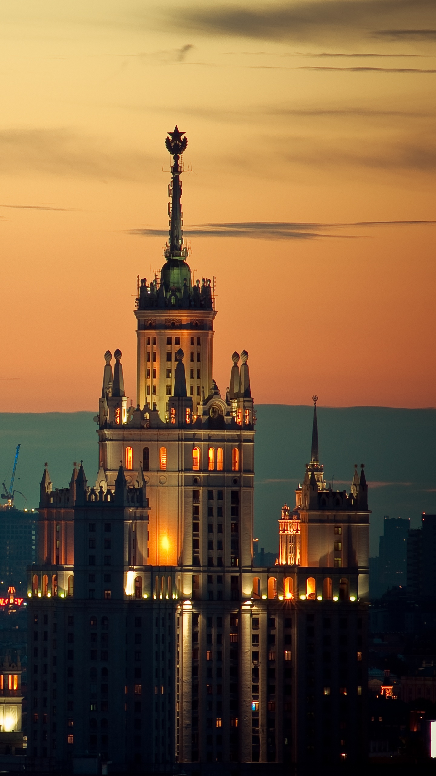 City With High Rise Buildings During Sunset. Wallpaper in 1440x2560 Resolution