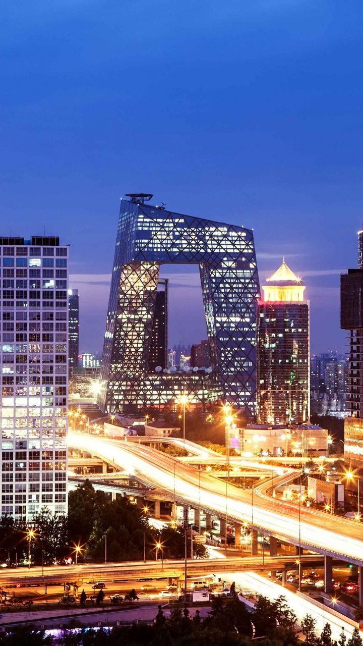 City Buildings During Night Time. Wallpaper in 720x1280 Resolution