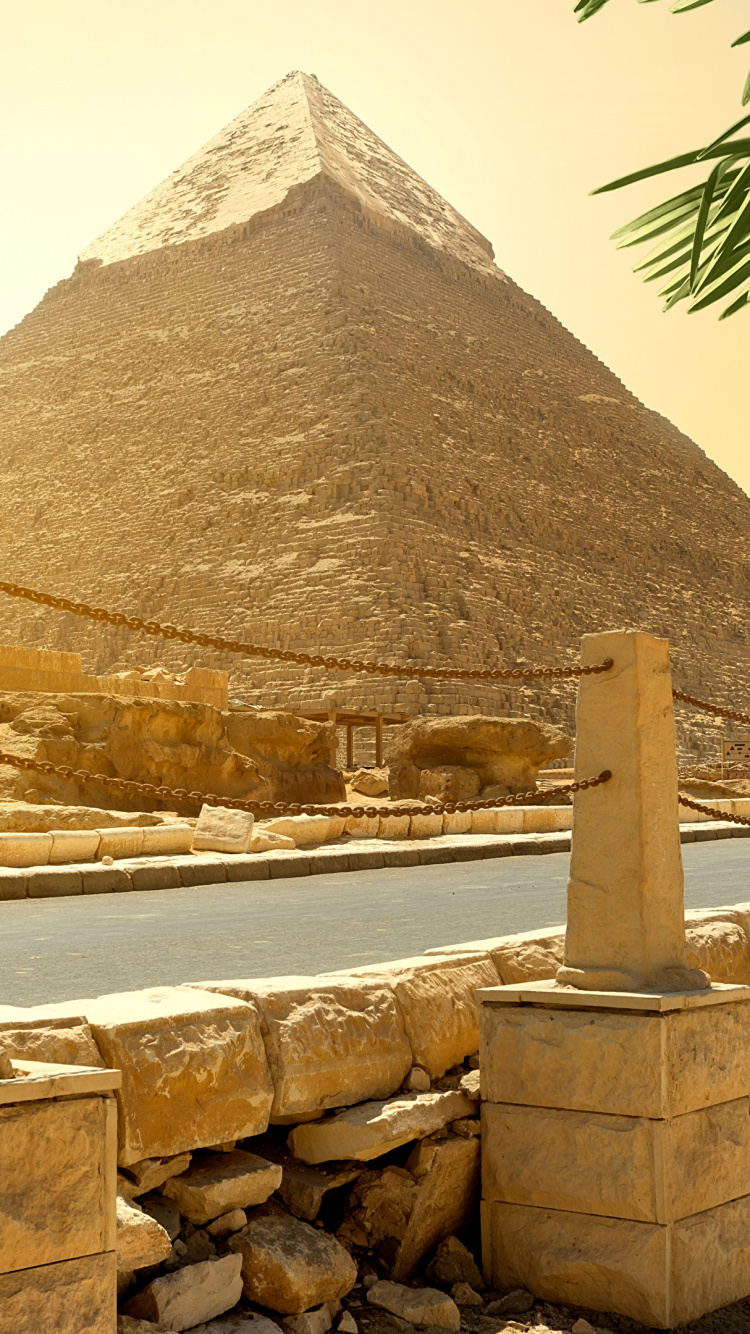 Pyramid Near Body of Water During Daytime. Wallpaper in 750x1334 Resolution