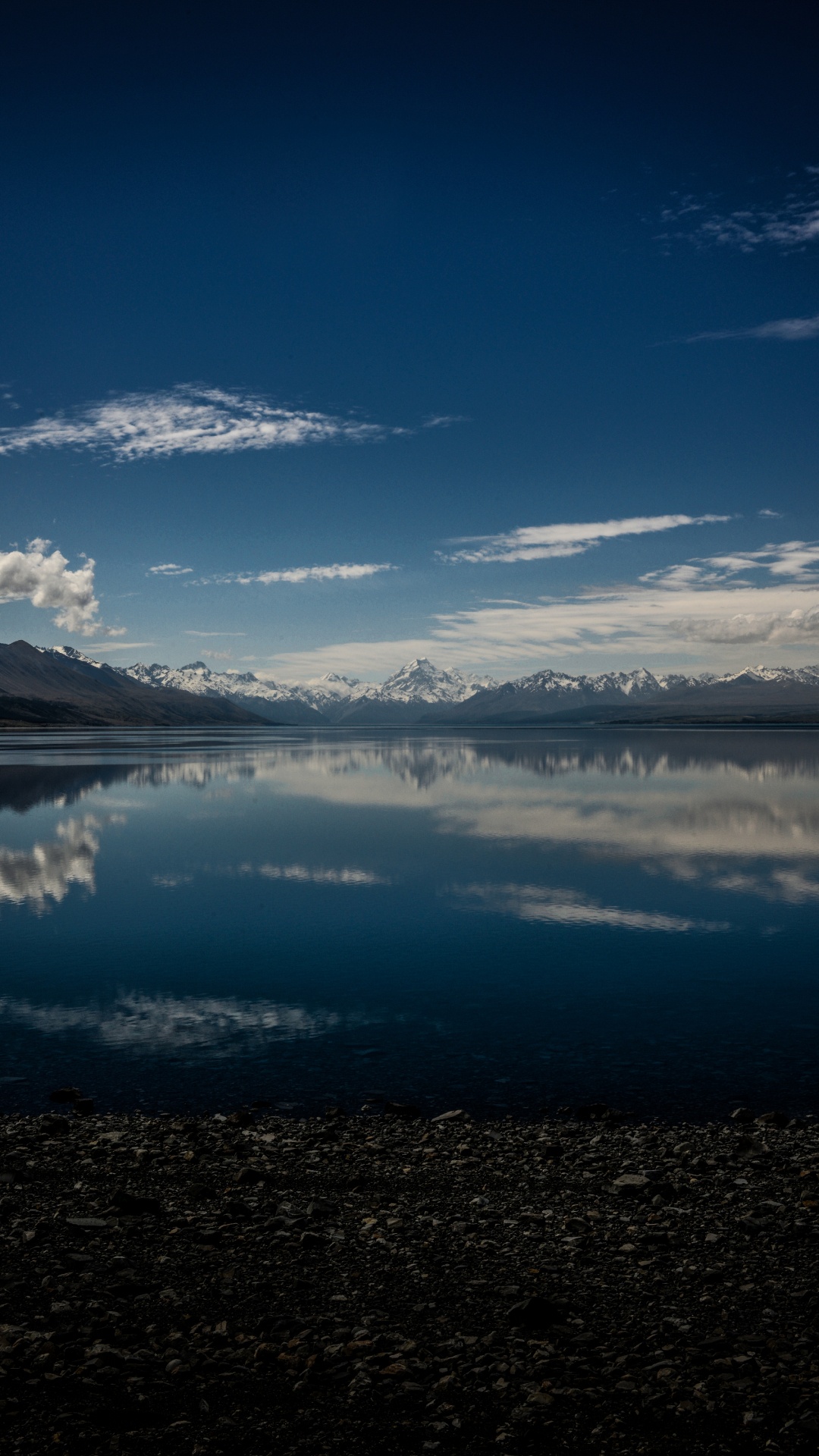 Body of Water Near Mountain Under Blue Sky During Daytime. Wallpaper in 1080x1920 Resolution