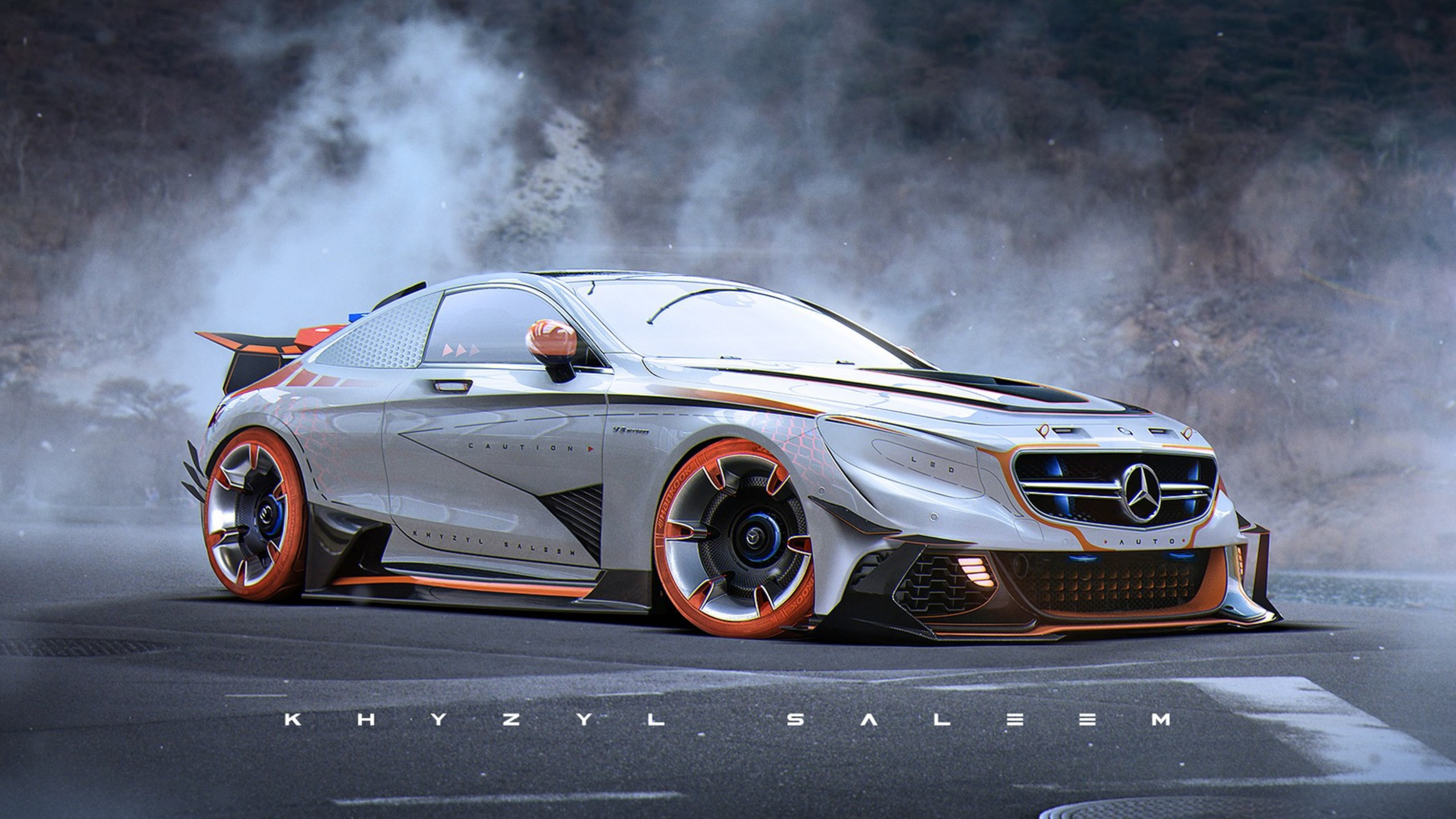 Argent Mercedes Benz Coupé Sur Route. Wallpaper in 2560x1440 Resolution