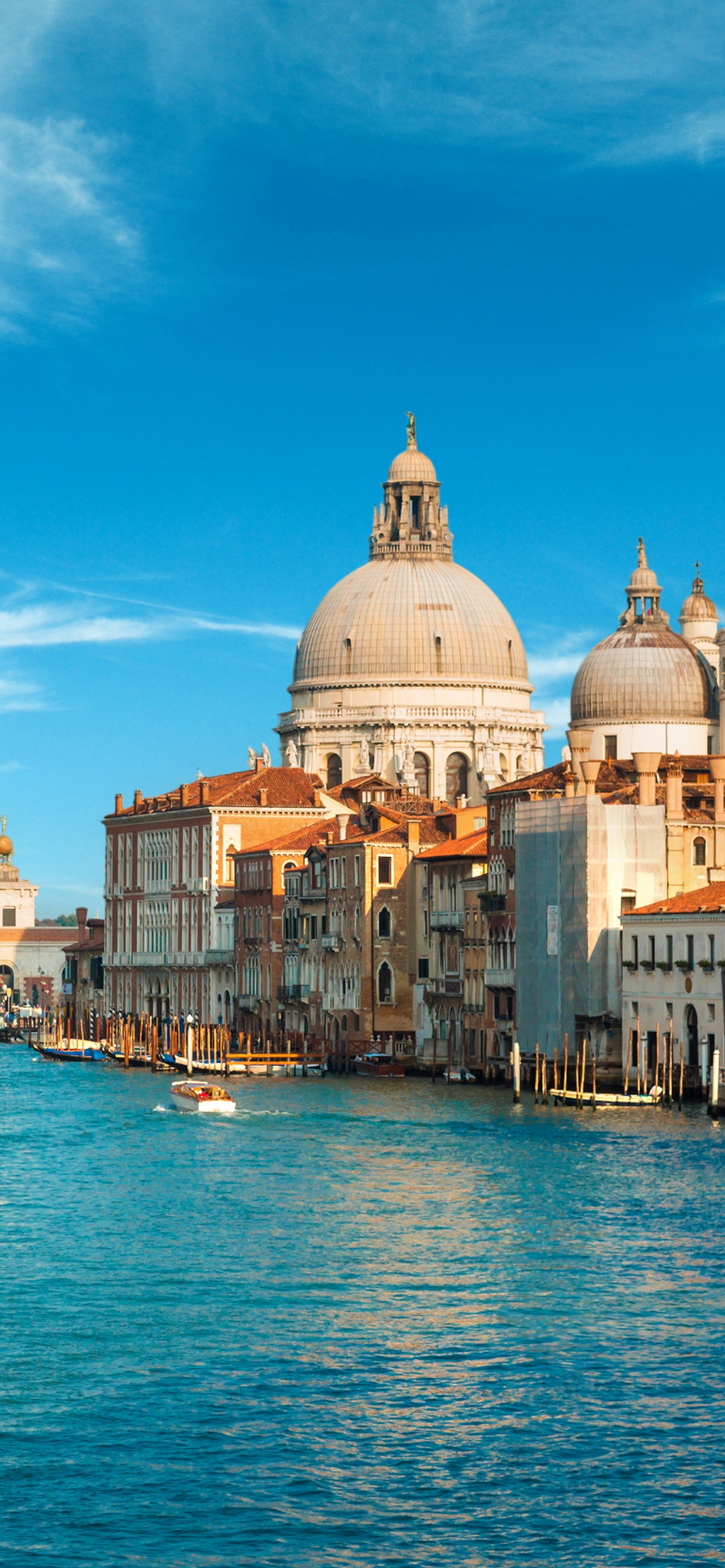 Body of Water Between Buildings Under Blue Sky During Daytime. Wallpaper in 1242x2688 Resolution