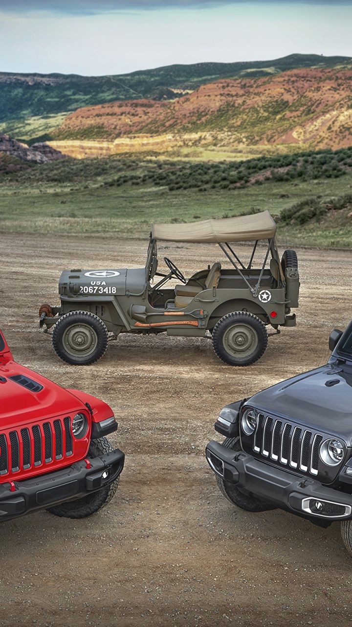 Red Jeep Wrangler on Dirt Road During Daytime. Wallpaper in 720x1280 Resolution