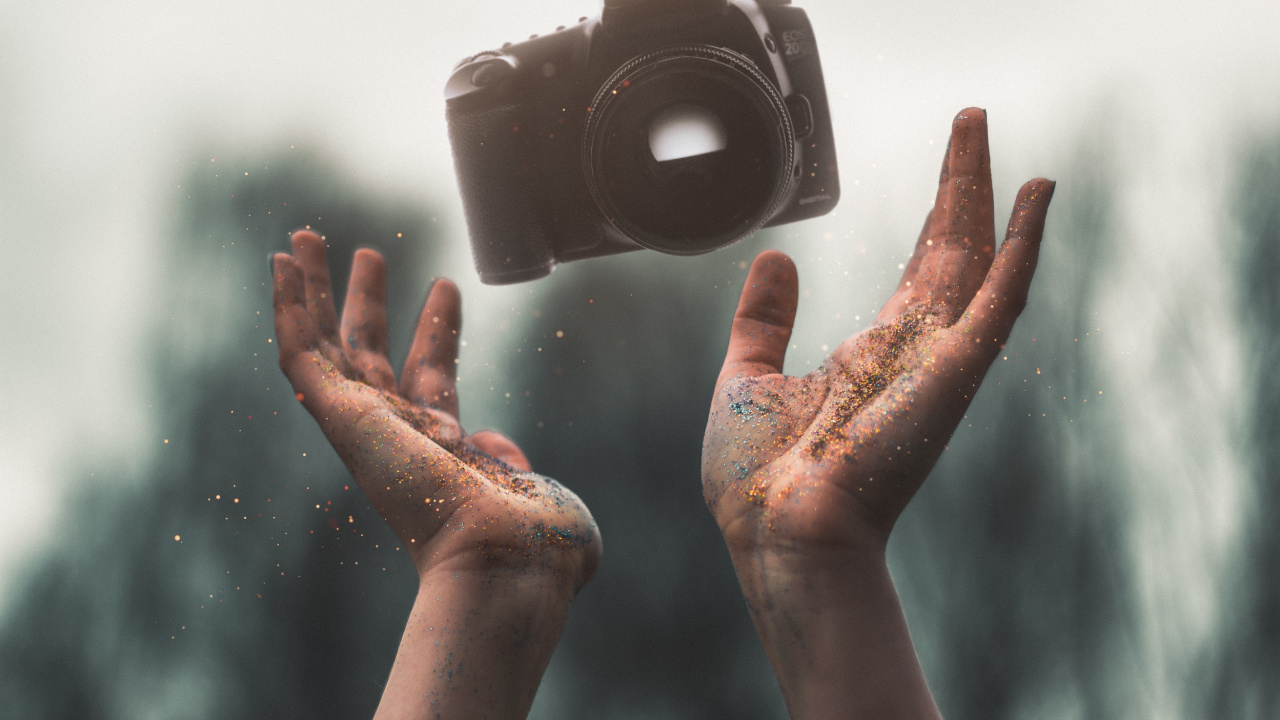 Person Holding Black Camera Lens. Wallpaper in 1280x720 Resolution