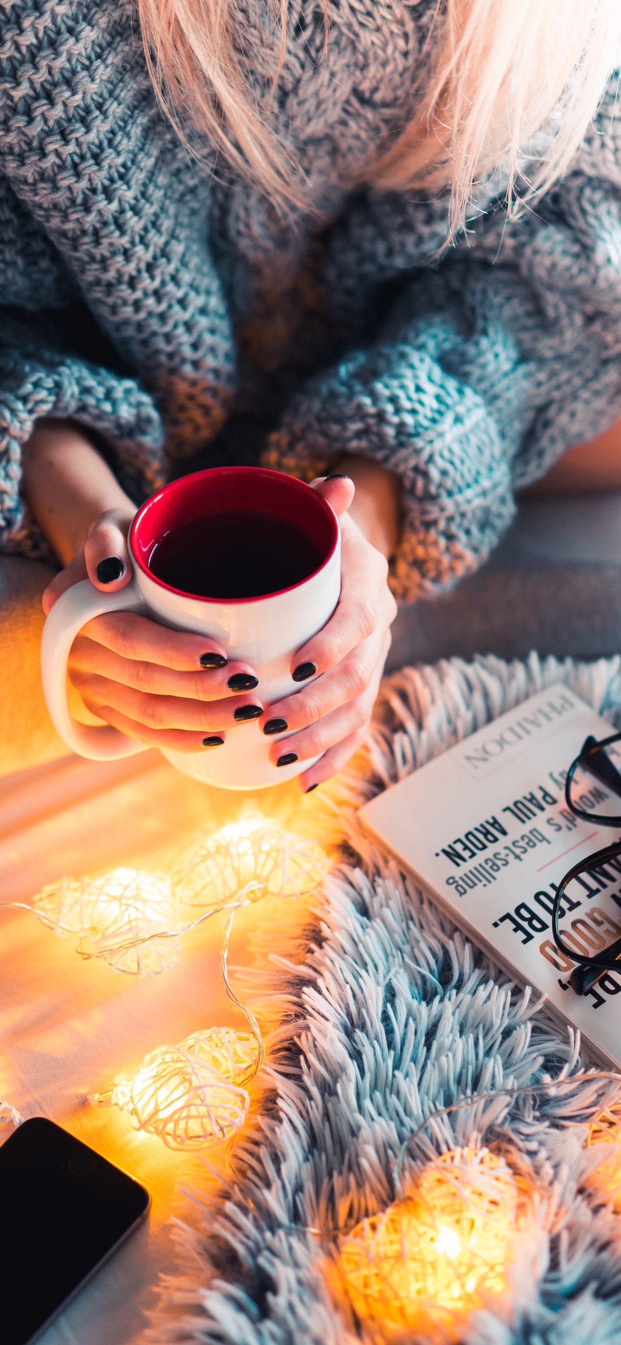 Woman in Gray and Black Sweater Holding White Ceramic Mug. Wallpaper in 1242x2688 Resolution
