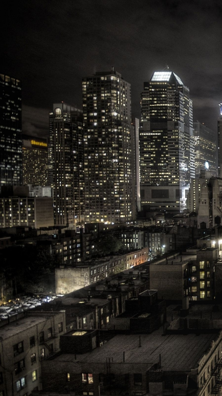 Bâtiments de la Ville Pendant la Nuit. Wallpaper in 750x1334 Resolution