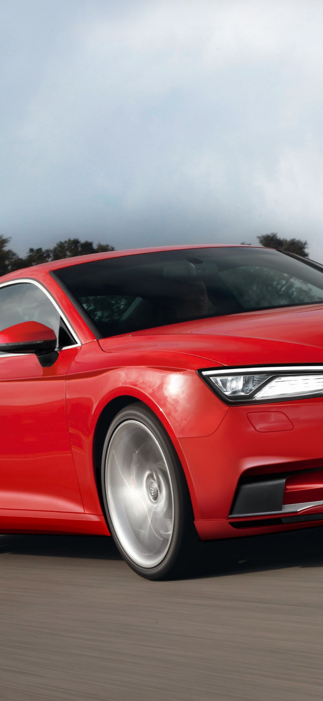 Rotes Audi Coupé Unterwegs. Wallpaper in 1125x2436 Resolution