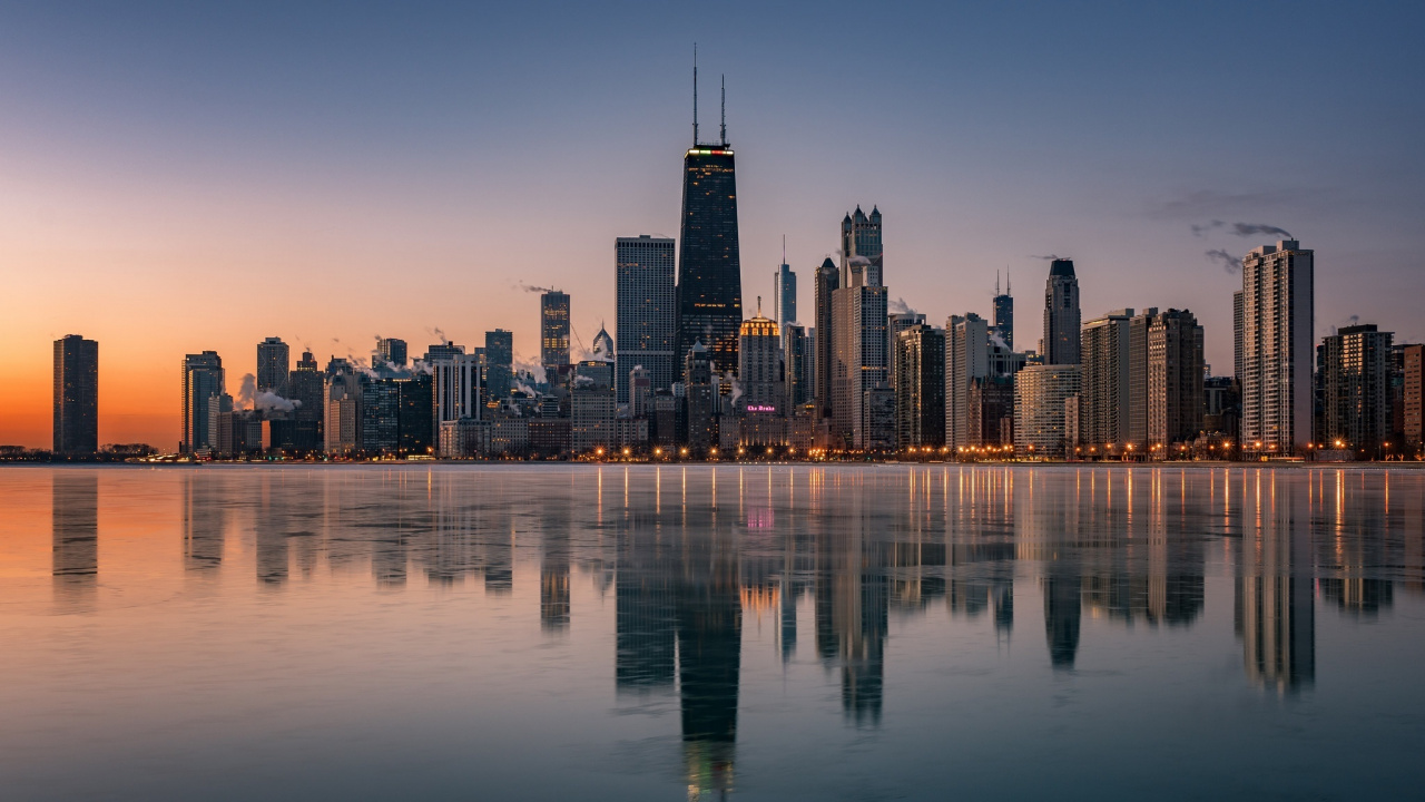 City Skyline Across Body of Water During Night Time. Wallpaper in 1280x720 Resolution