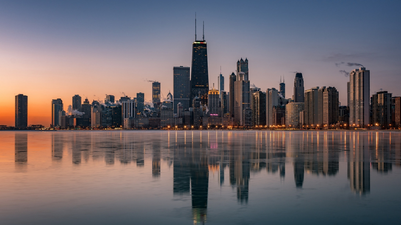 City Skyline Across Body of Water During Night Time. Wallpaper in 1366x768 Resolution