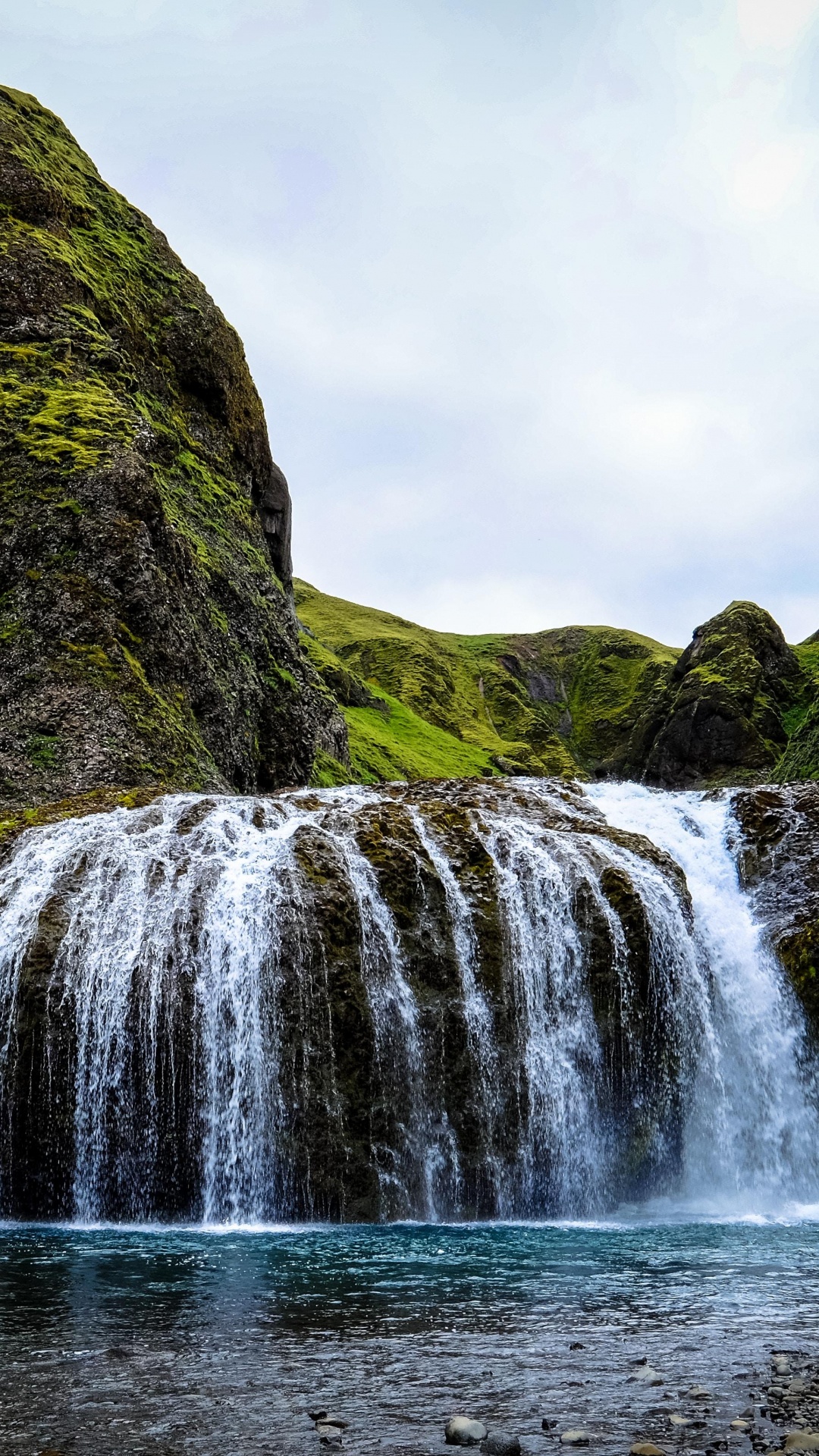 Waterfalls on Green Mountain Under White Sky During Daytime. Wallpaper in 1080x1920 Resolution