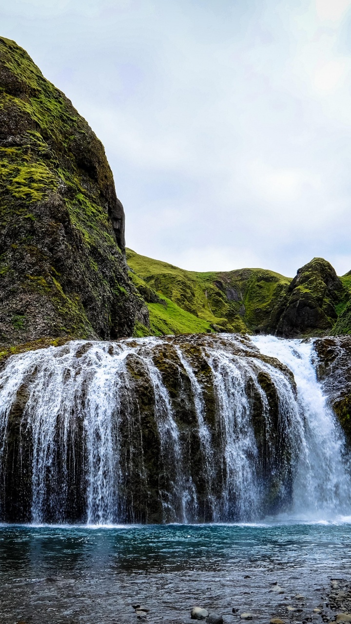 Waterfalls on Green Mountain Under White Sky During Daytime. Wallpaper in 720x1280 Resolution