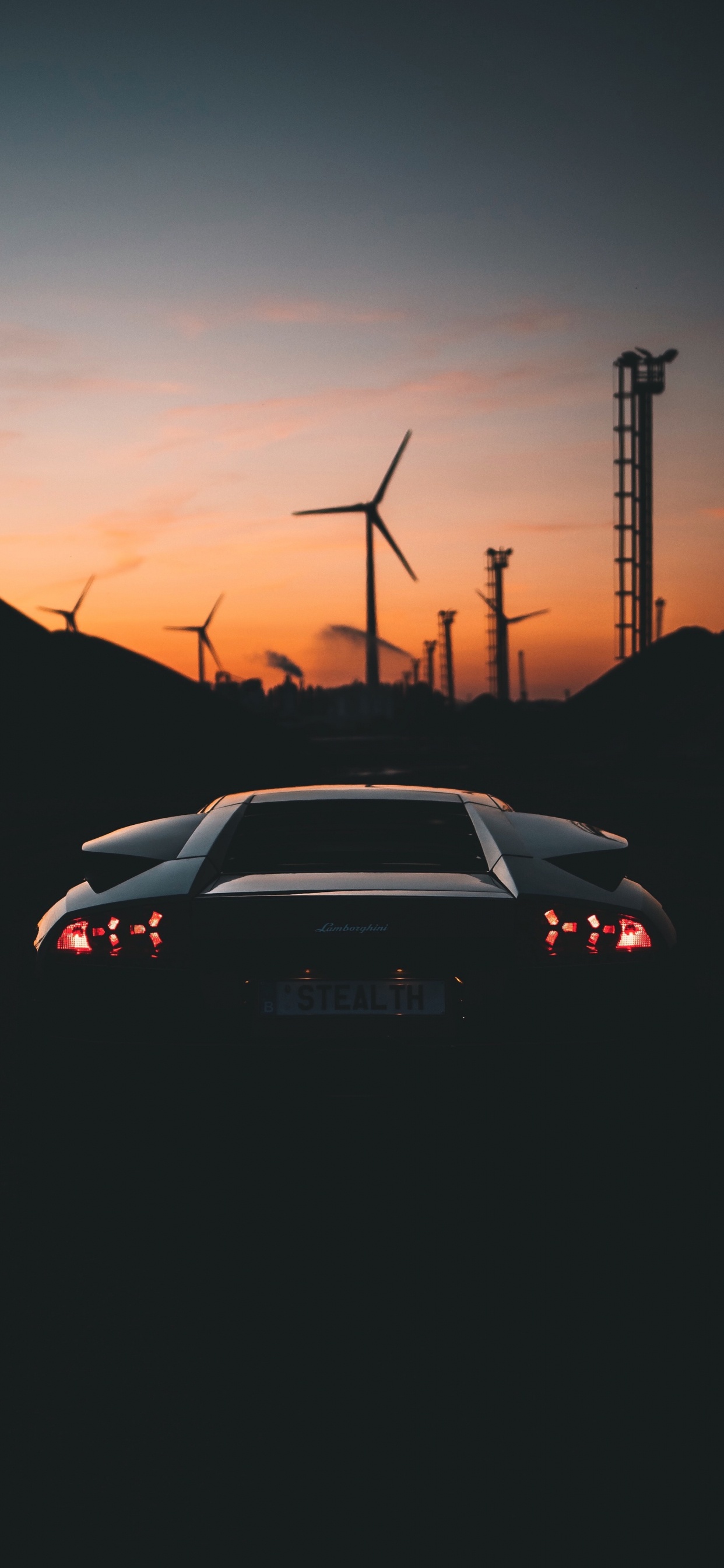 White Sedan on Road During Sunset. Wallpaper in 1242x2688 Resolution