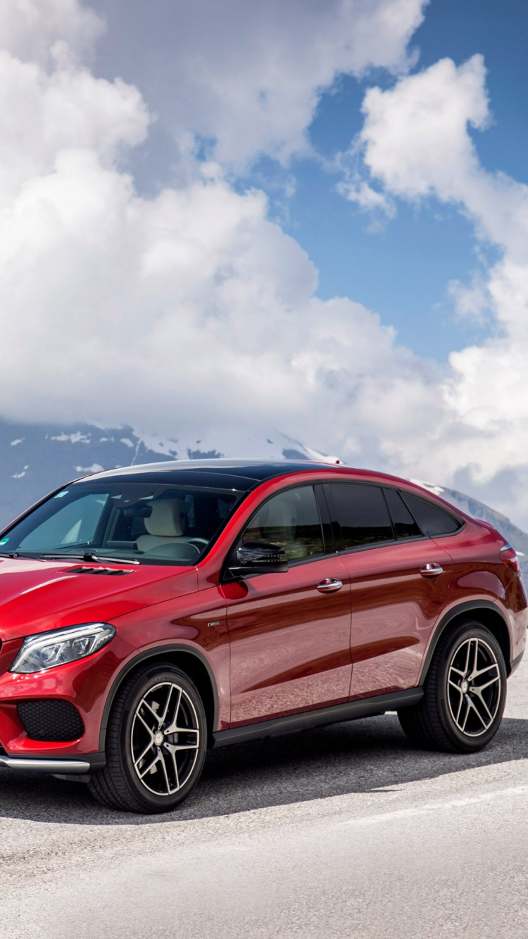 Red Bmw m 3 on Road Near Snow Covered Mountain. Wallpaper in 750x1334 Resolution