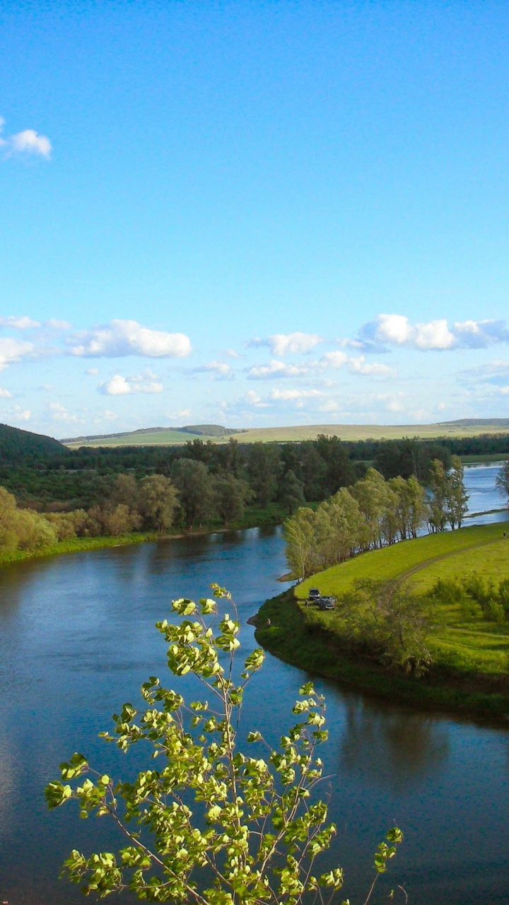Green Grass Field Near Lake Under Blue Sky During Daytime. Wallpaper in 720x1280 Resolution