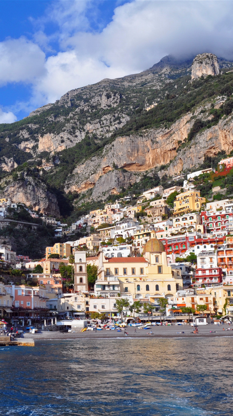 Houses Near Body of Water and Mountain Under Blue Sky During Daytime. Wallpaper in 750x1334 Resolution