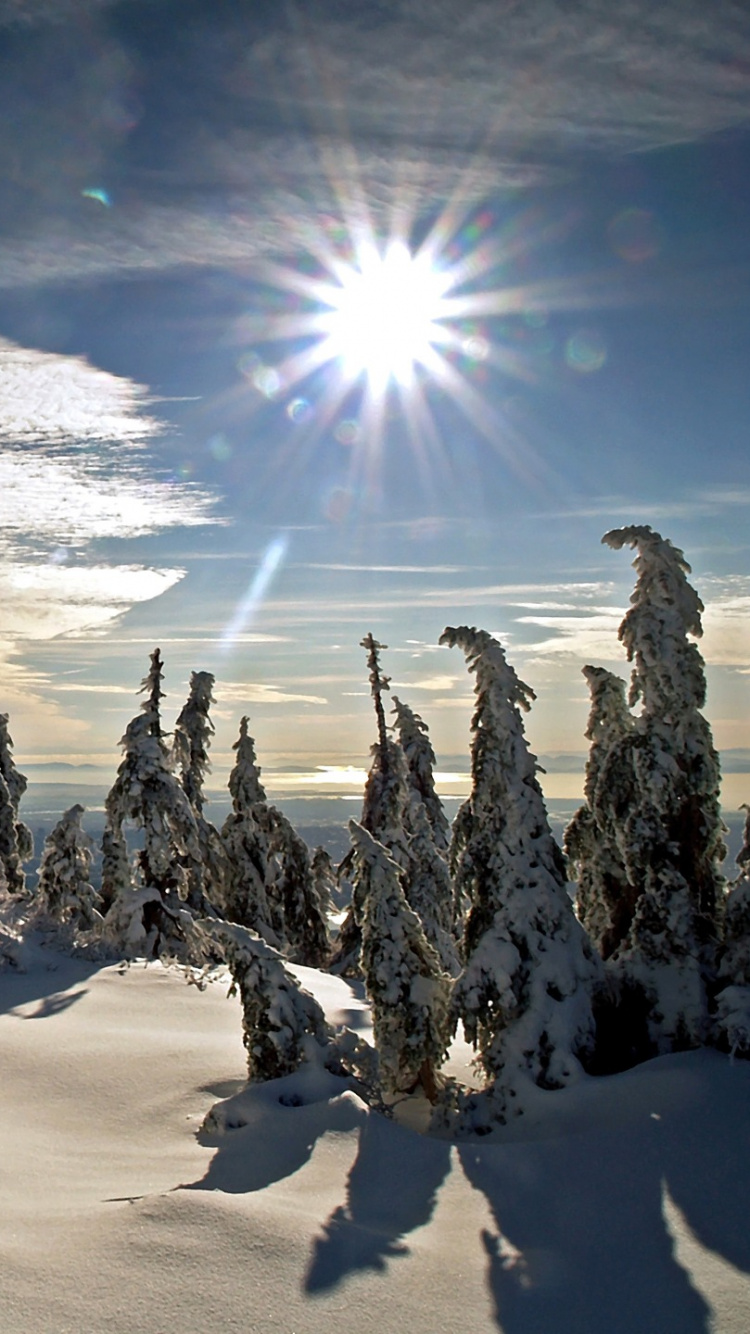 Snow Covered Mountain Under Blue Sky During Daytime. Wallpaper in 750x1334 Resolution