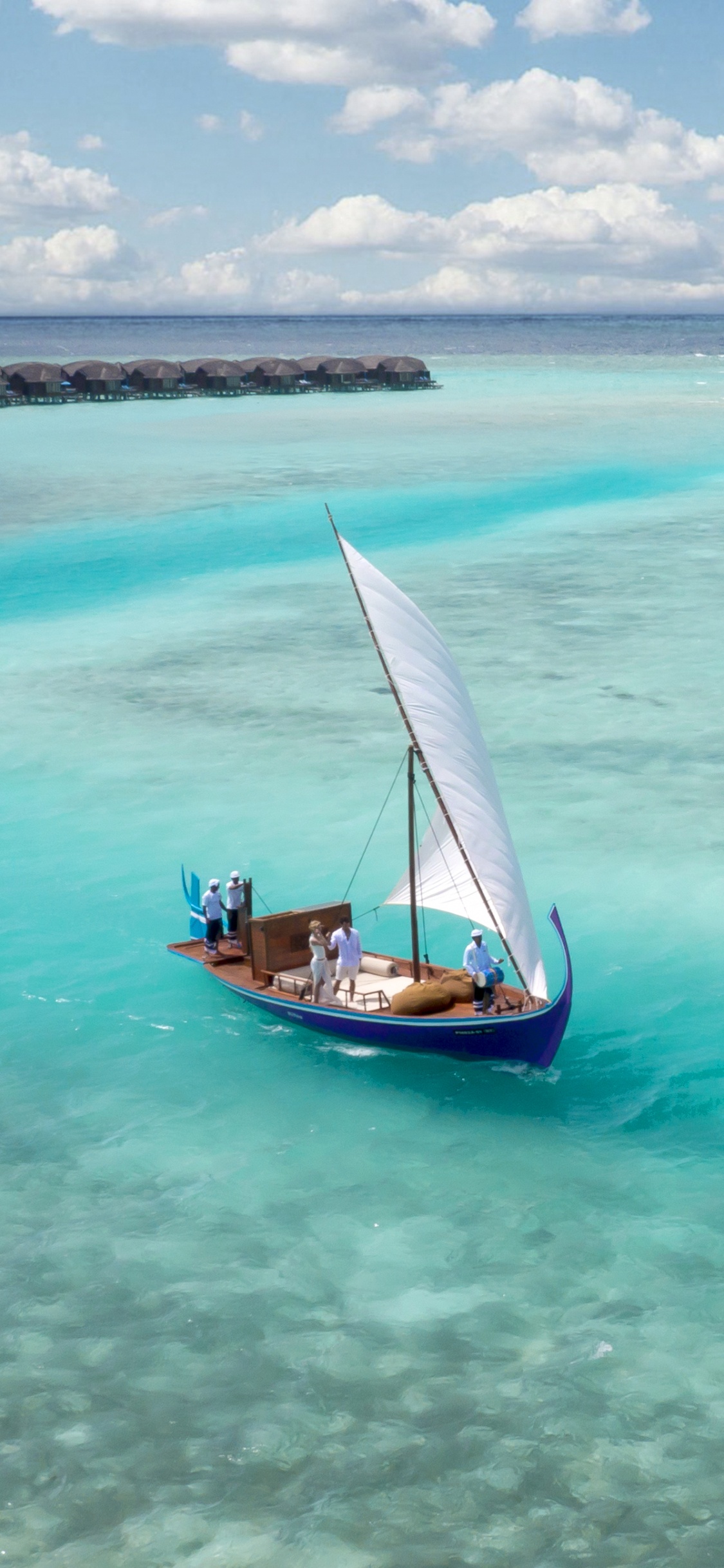 Brown Boat on Sea During Daytime. Wallpaper in 1125x2436 Resolution