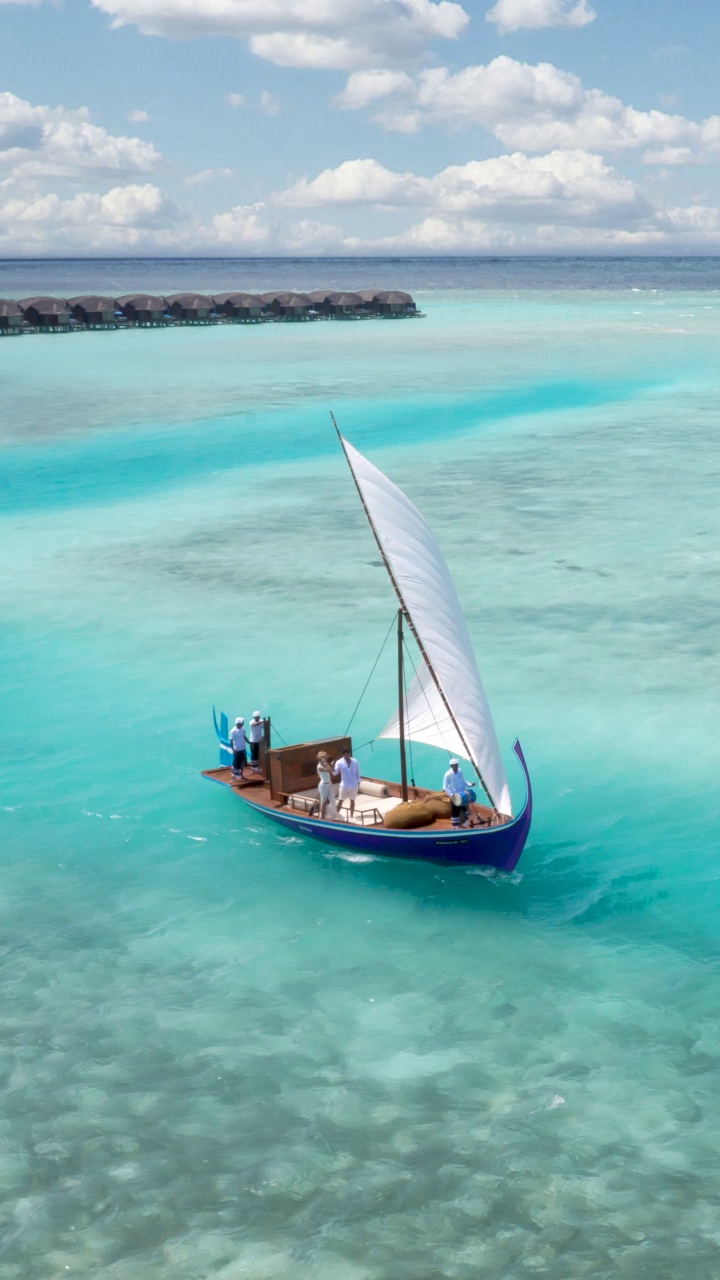 Brown Boat on Sea During Daytime. Wallpaper in 720x1280 Resolution