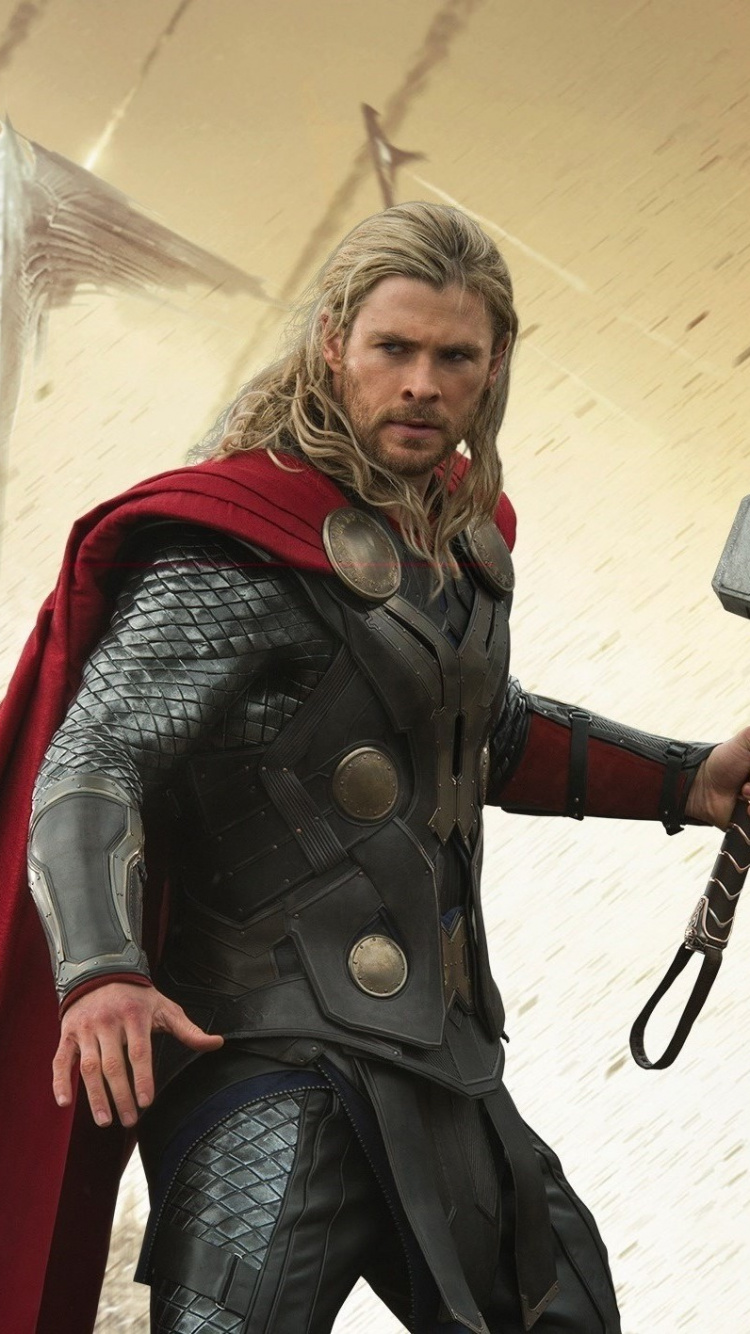 Hombre en Traje de Camuflaje Verde y Marrón Sosteniendo Una Herramienta Eléctrica Negra y Gris. Wallpaper in 750x1334 Resolution