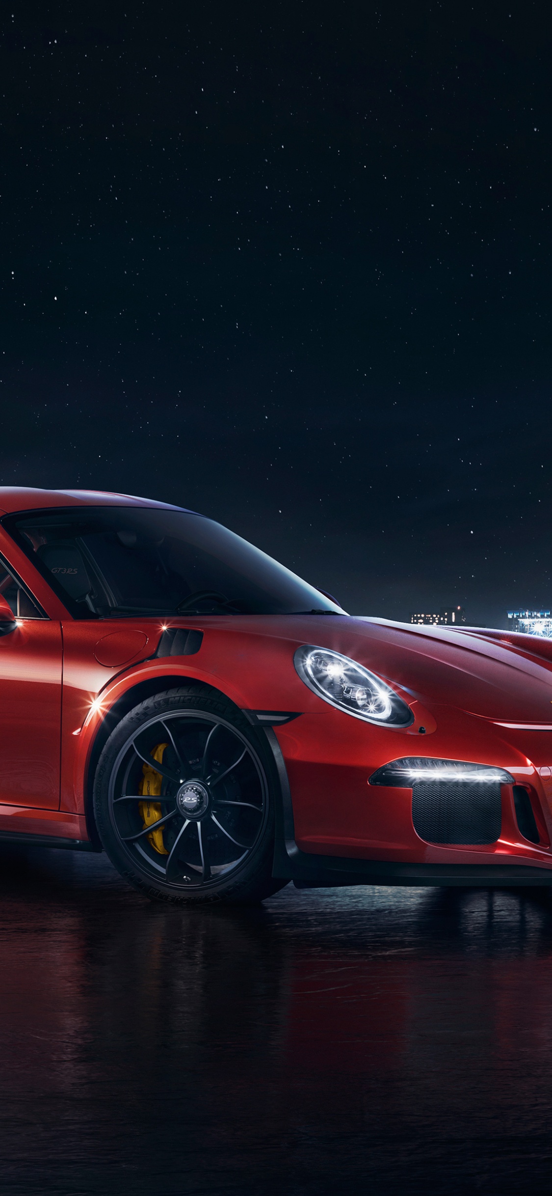 Red Porsche 911 on Black Surface. Wallpaper in 1125x2436 Resolution