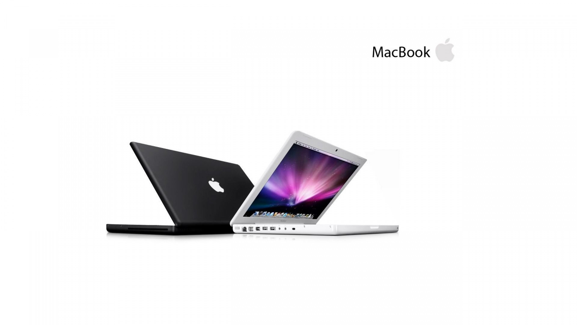 Macbook Pro Plateado Sobre Fondo Negro. Wallpaper in 1920x1080 Resolution
