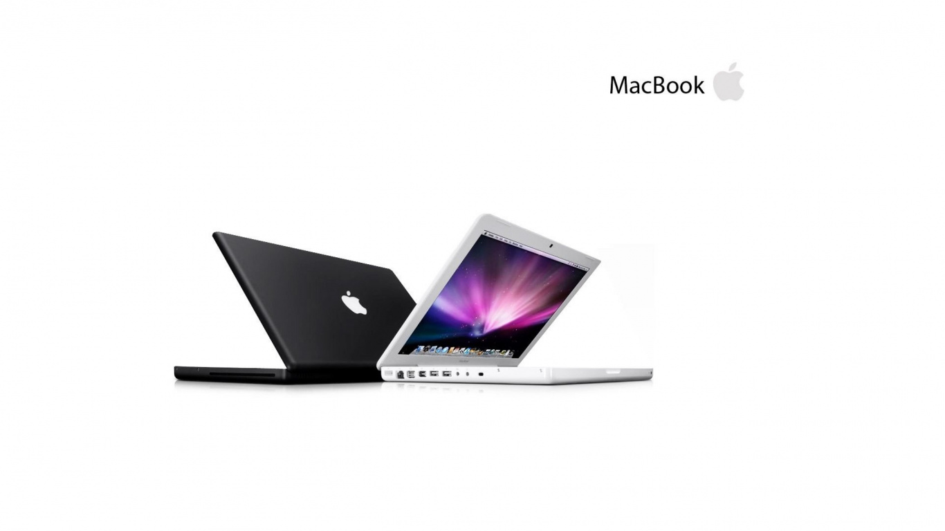 Silver Macbook Pro on Black Background. Wallpaper in 1366x768 Resolution