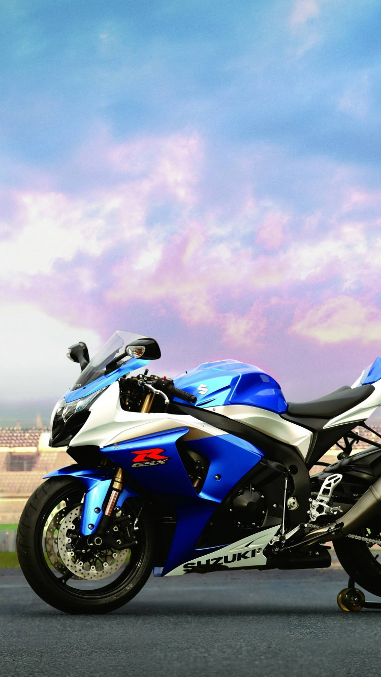Blue and Black Sports Bike on Road During Daytime. Wallpaper in 750x1334 Resolution
